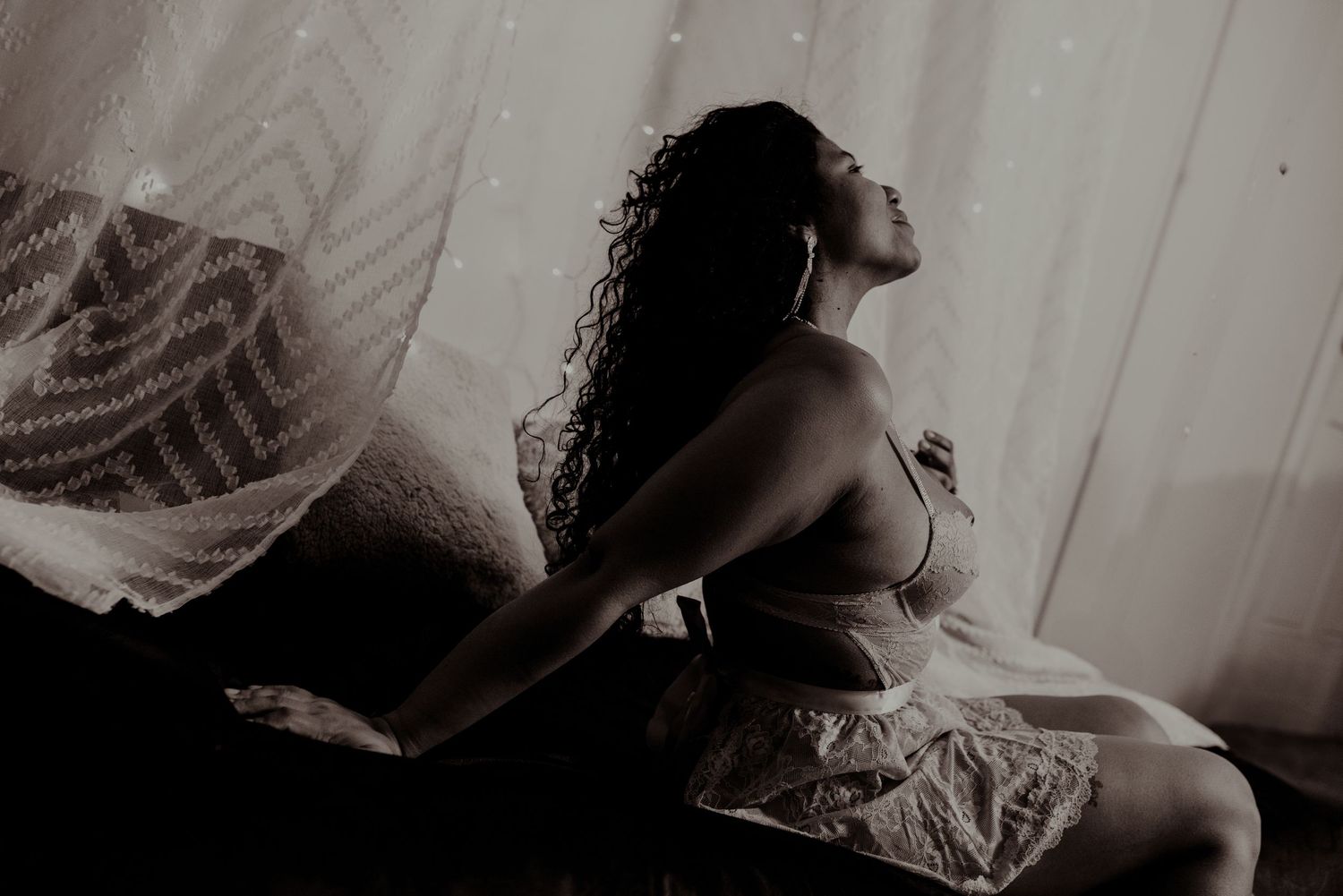 A series of intimate black and white photos showing a couple in romantic poses during a wedding celebration.