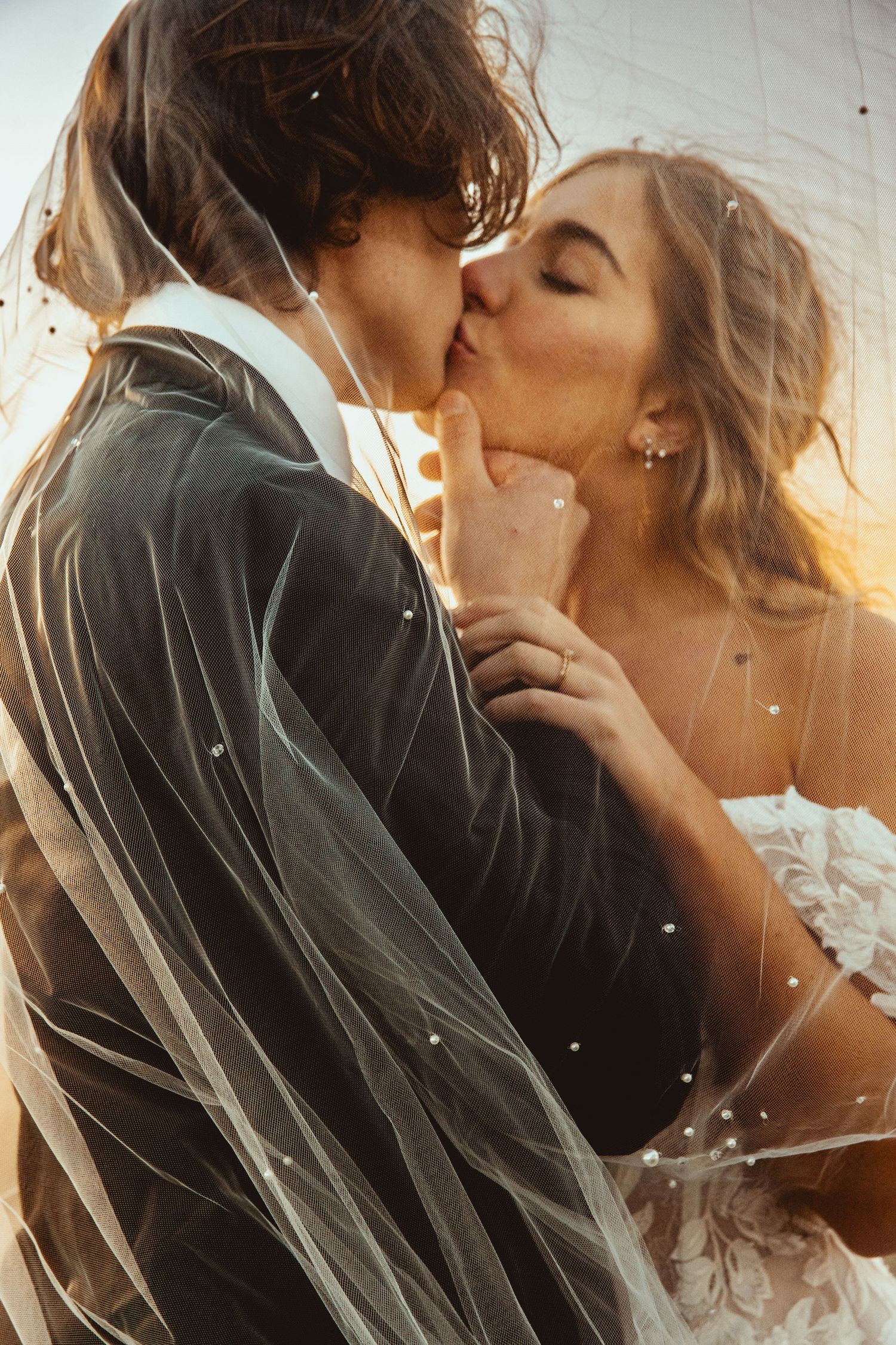 Romantic couple sharing intimate kisses in a series of dreamy sunset-lit photographs.