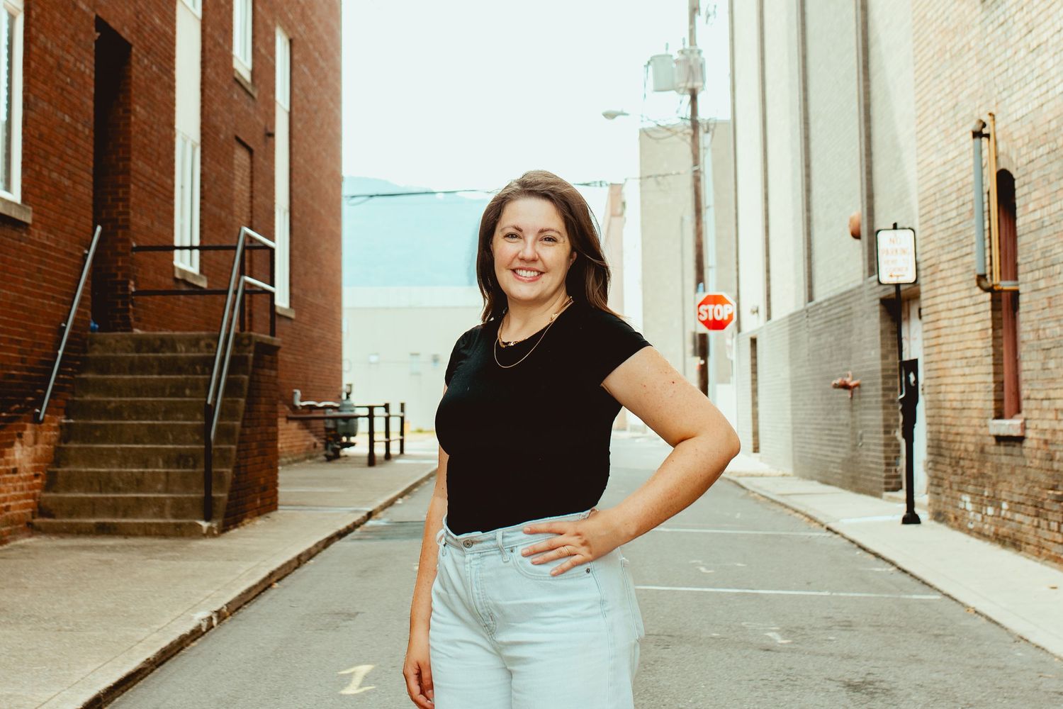 A series of seven connected photos showing someone in casual attire posing against brick walls and urban backdrops.