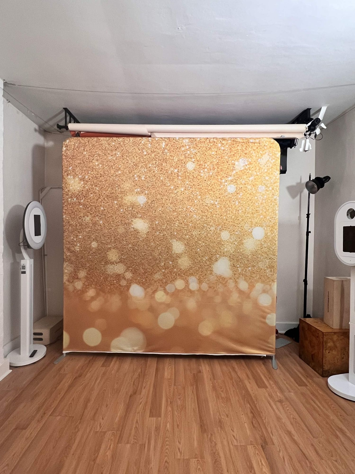 A shimmering gold glitter bokeh photography backdrop for studio and photo booth use.