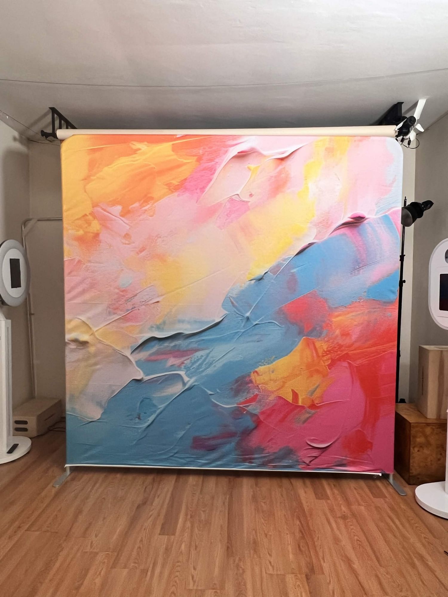 A vibrant abstract colorful painted canvas photography backdrop for studio photo shoots.