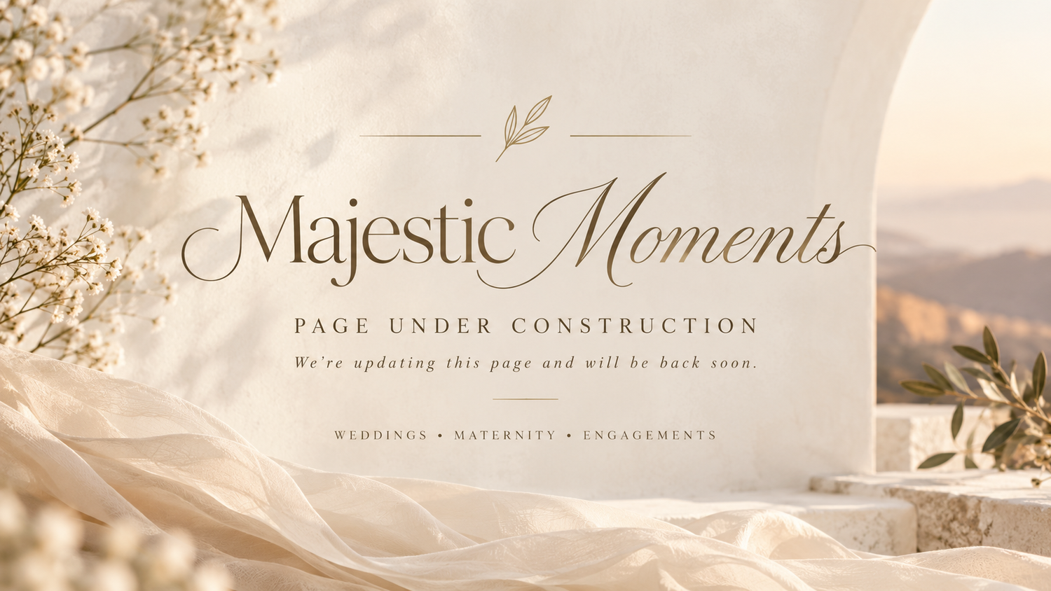 Majestic Moments photography studio page under construction banner for weddings, maternity, and engagements.