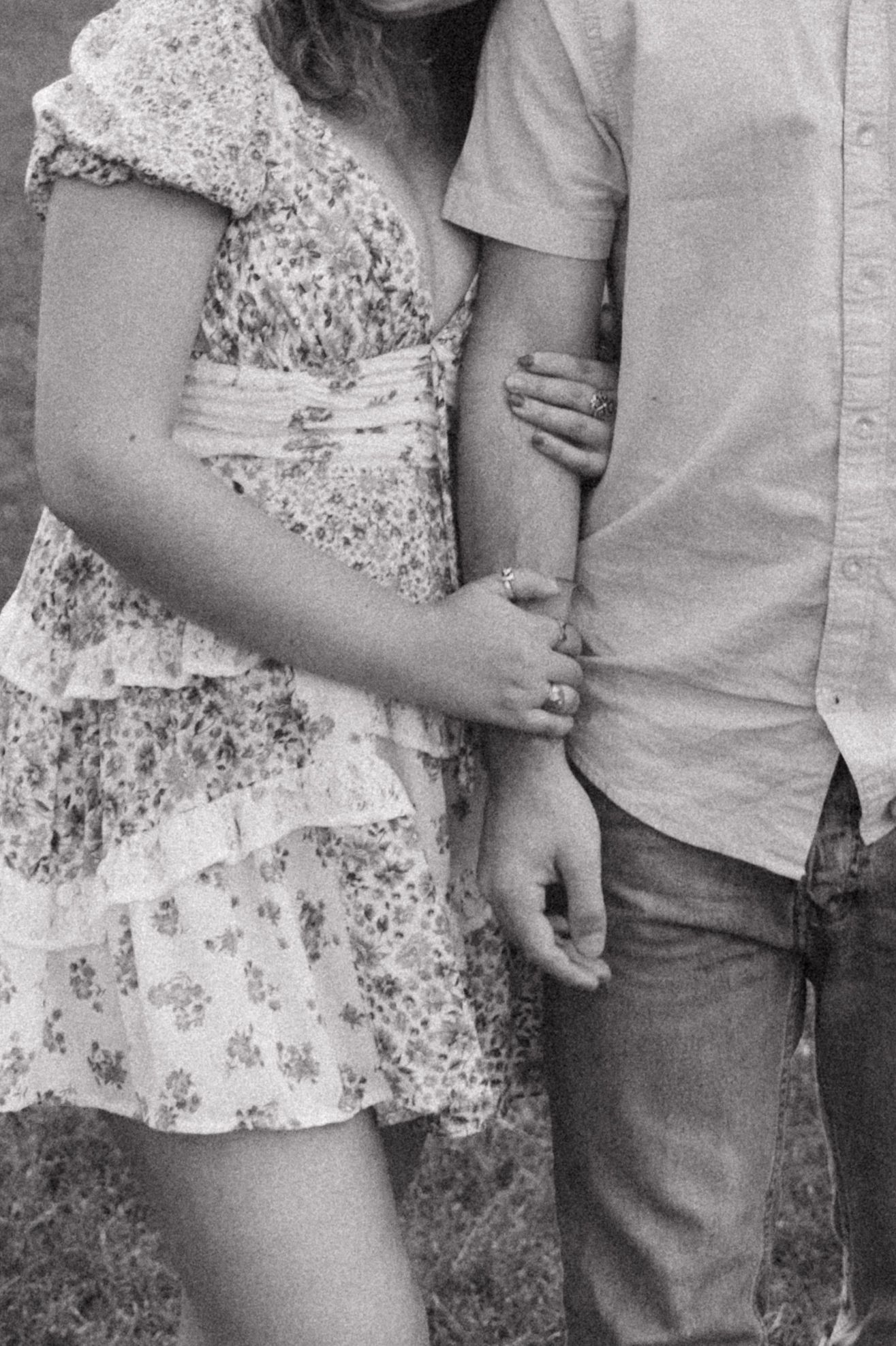 Couple standing close - black and white