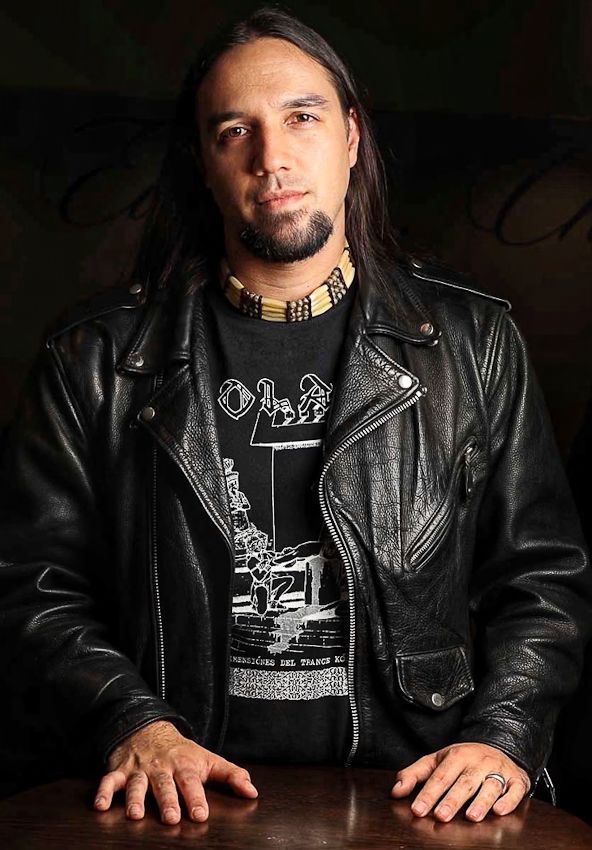 A series of dark artistic portrait photos showing someone wearing a black leather jacket against a dark background.