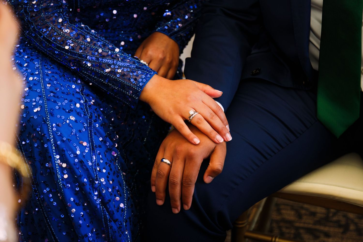 Amateur edited photo of a couple at an engagement party after exchanging rings - candid moment