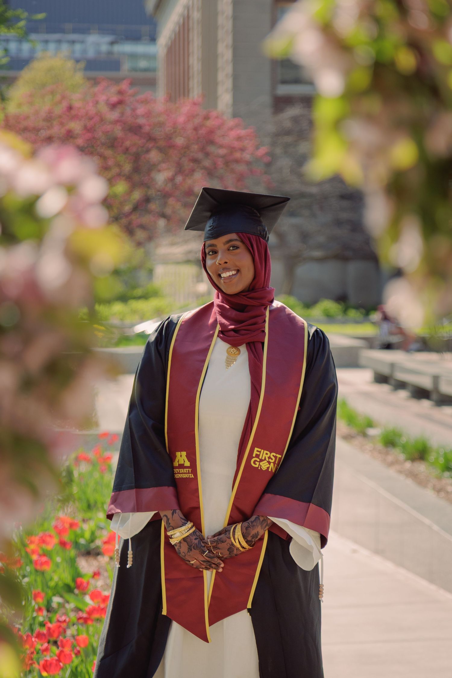 Graduation portrait of student, taken at the University of Minnesota Twin Cities.