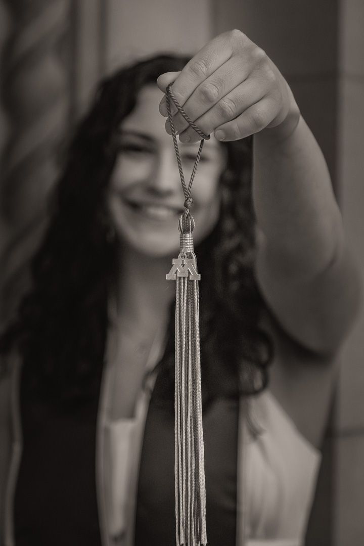 Graduation portrait of student, taken at the University of Minnesota Twin Cities - black and white photo.