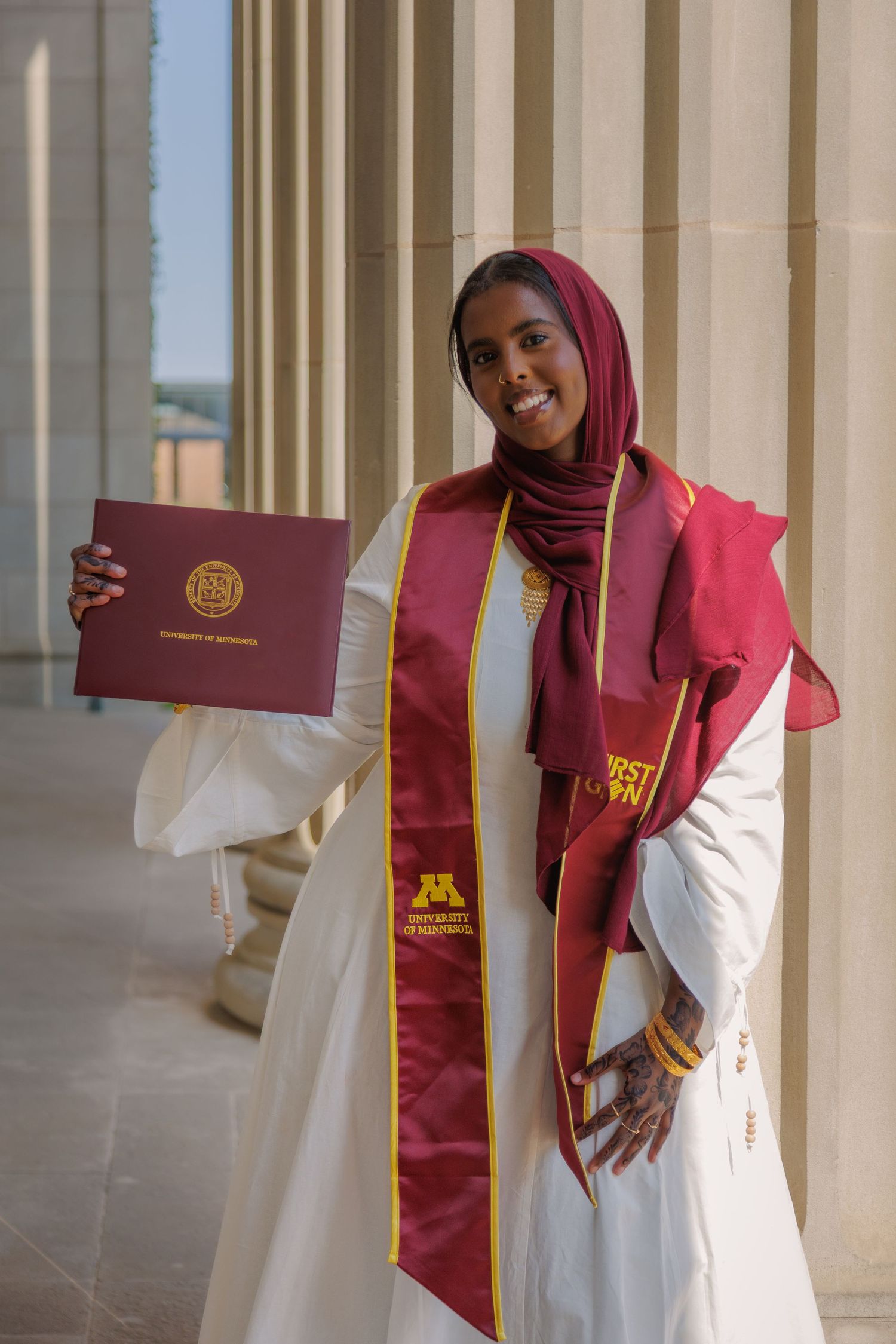 Graduation portrait of student, taken at the University of Minnesota Twin Cities.