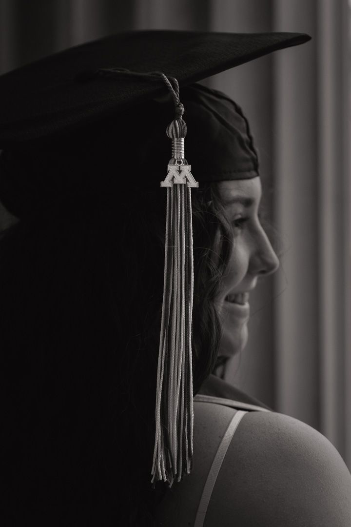Graduation portrait of student, taken at the University of Minnesota Twin Cities - black and white photo.