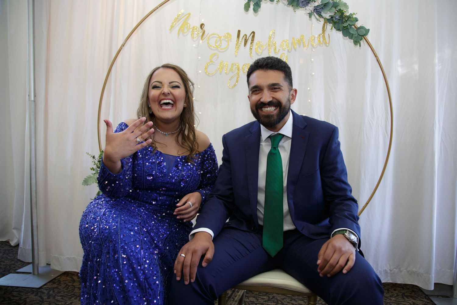 RAW unedited photo of a couple at an engagement party - candid moment