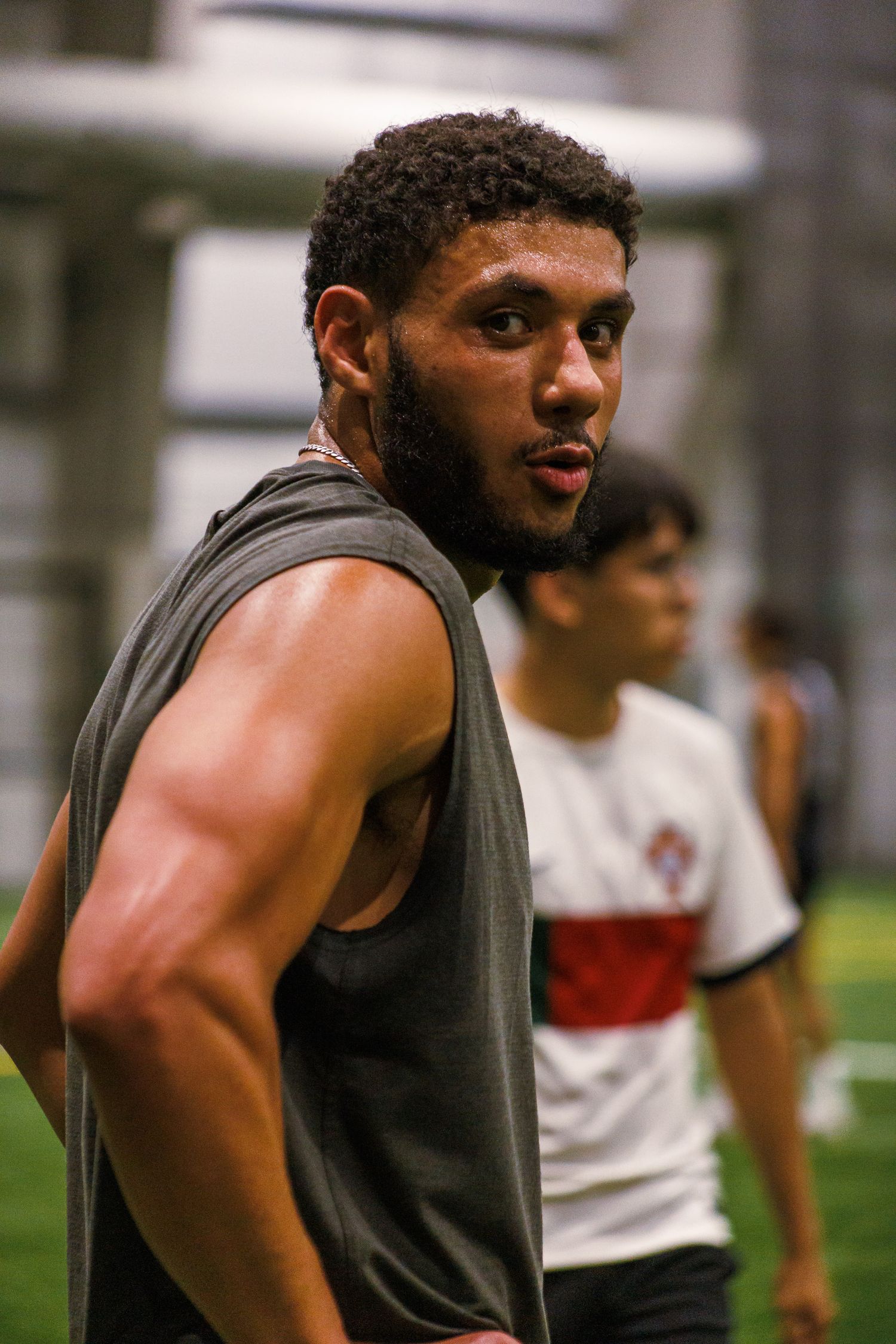 Athlete on the sideline during an indoor Twin Cities sports game