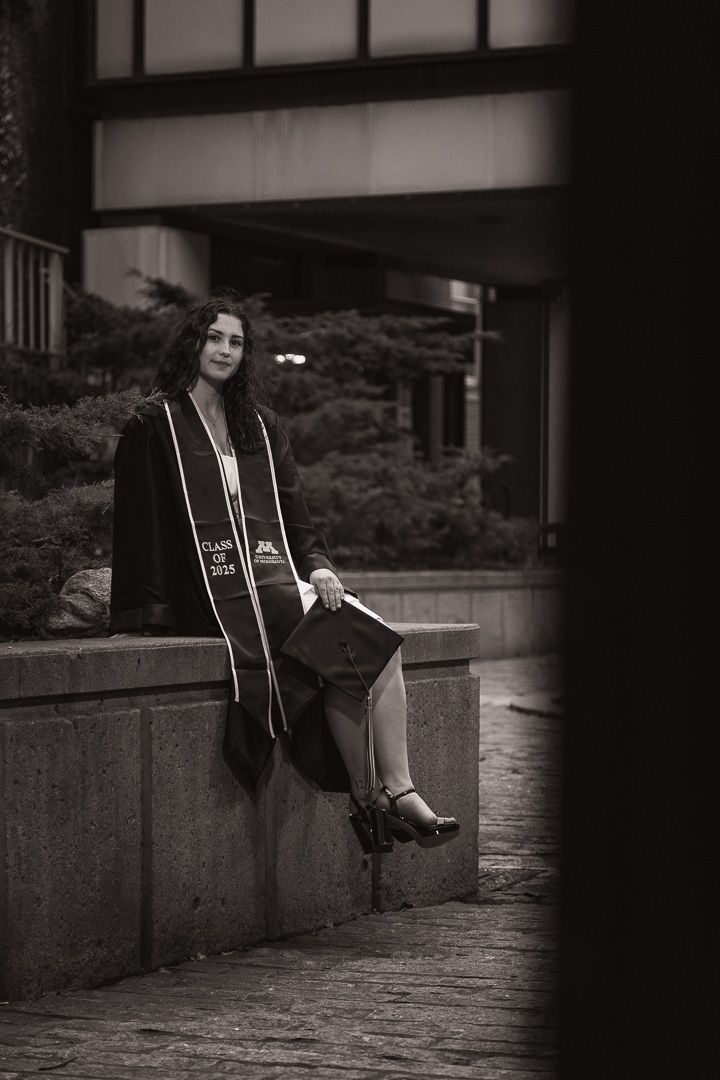 Graduation portrait of student, taken at the University of Minnesota Twin Cities - black and white photo.