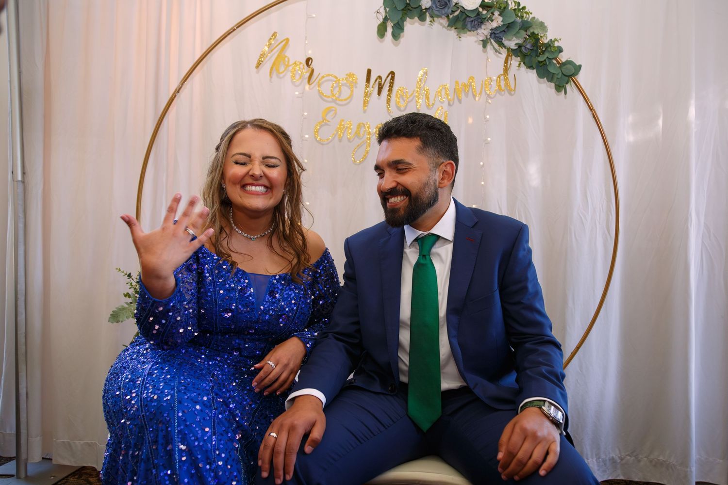 Couple at an engagement party after exchanging rings - a happy moment