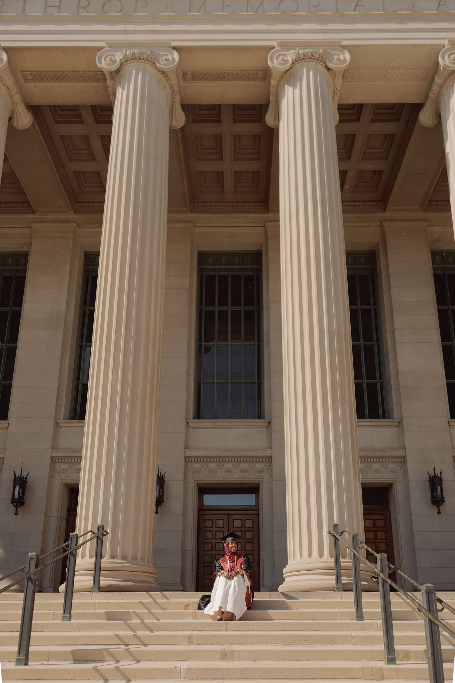 Graduation portrait of student, taken at the University of Minnesota Twin Cities.