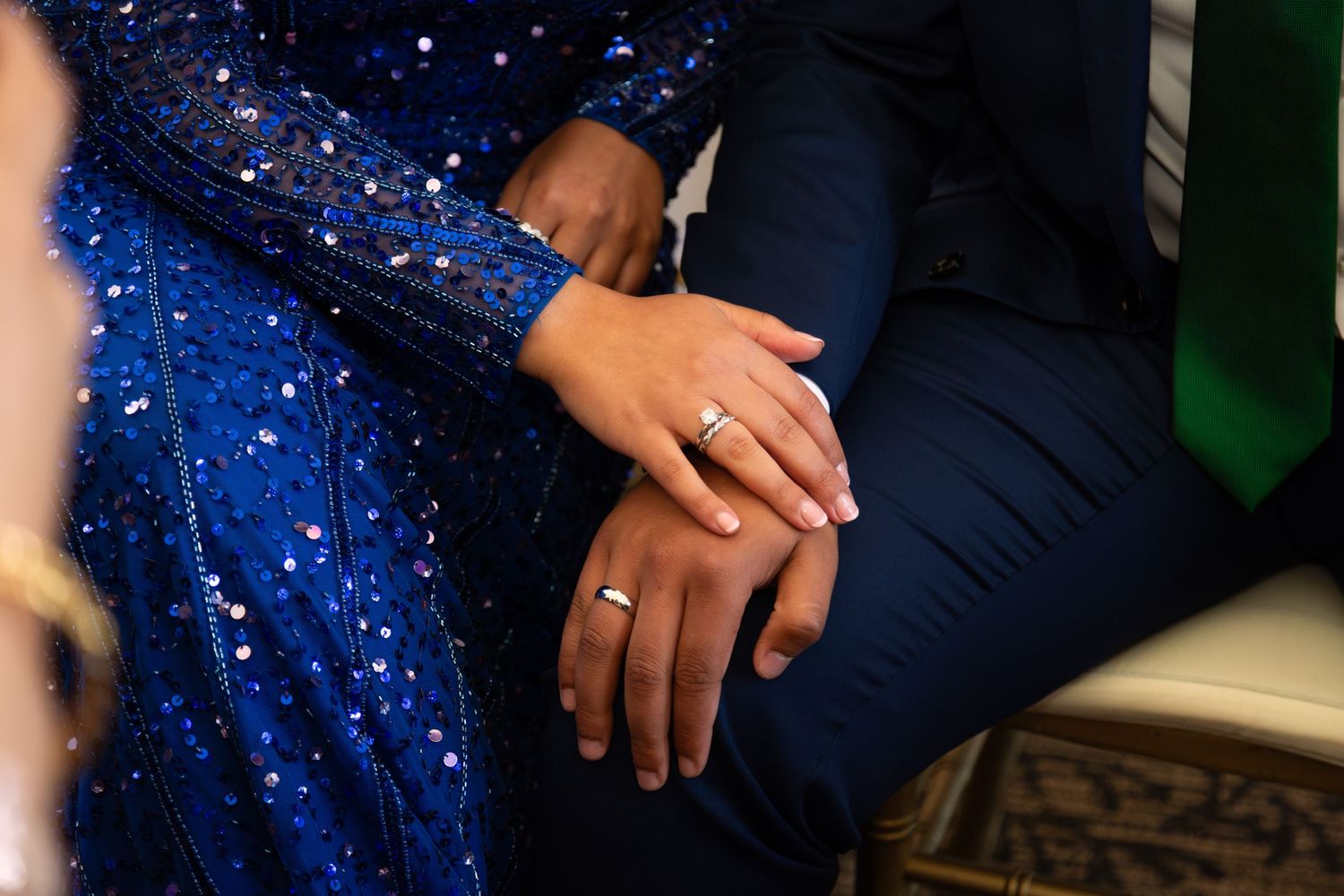 Professionaly edited photo of a couple at an engagement party after exchanging rings - candid moment