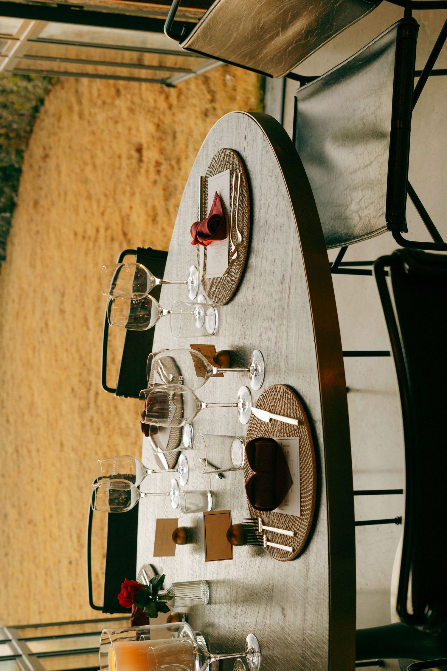 Circular wall-mounted wine racks with modern industrial design.