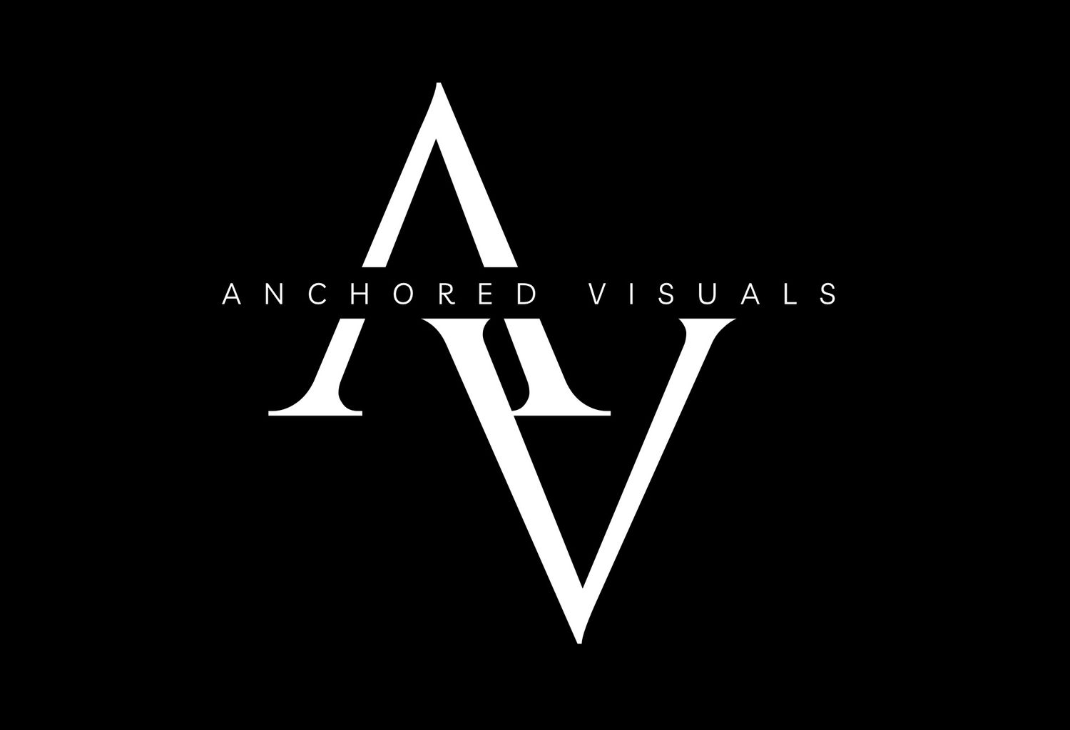 Black and white logo for Anchored Visuals featuring geometric AV monogram design on black background.