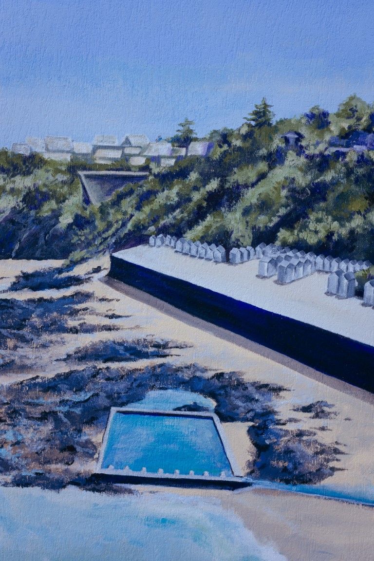 Painting of a coastal beach scene with a pool, seawall, beach huts, and lush green hillside with buildings.