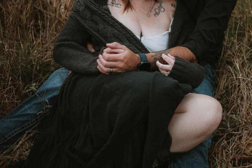 Candid outdoor portrait session showing casual clothing and natural poses.
