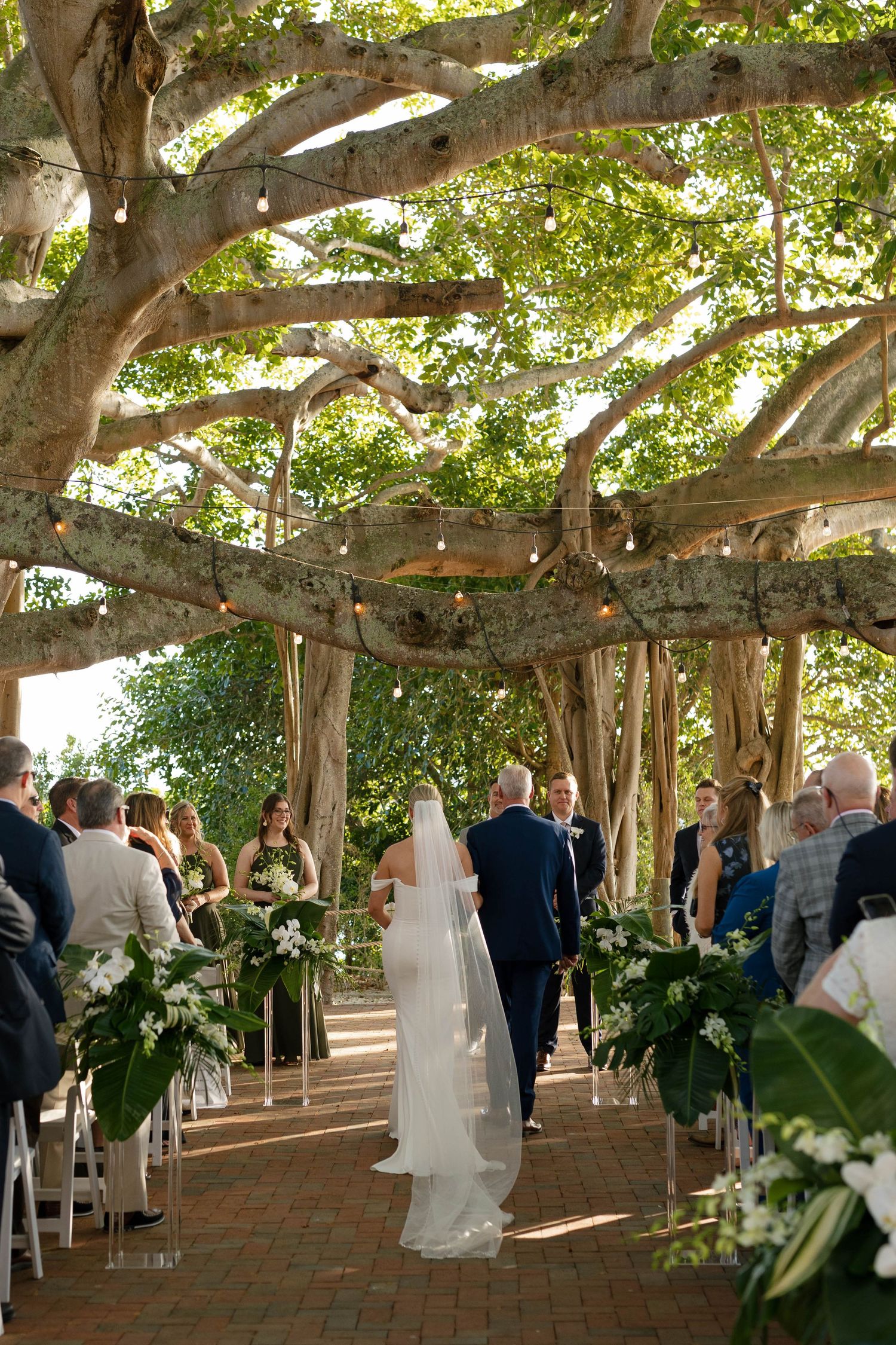 Editorial wedding portraits of a newlywed couple at the iconic Jupiter Inlet Lighthouse in beautiful Jupiter, Florida.