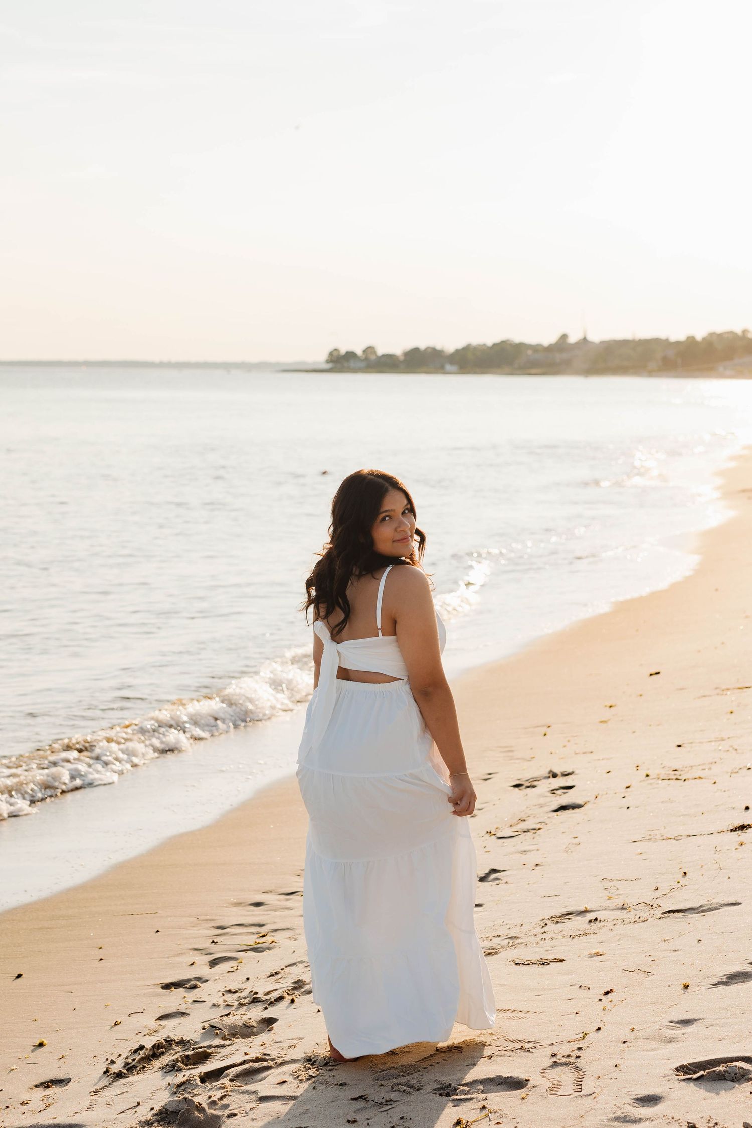 Senior session at Harkness Memorial State Park showing multiple looks and locations in one session