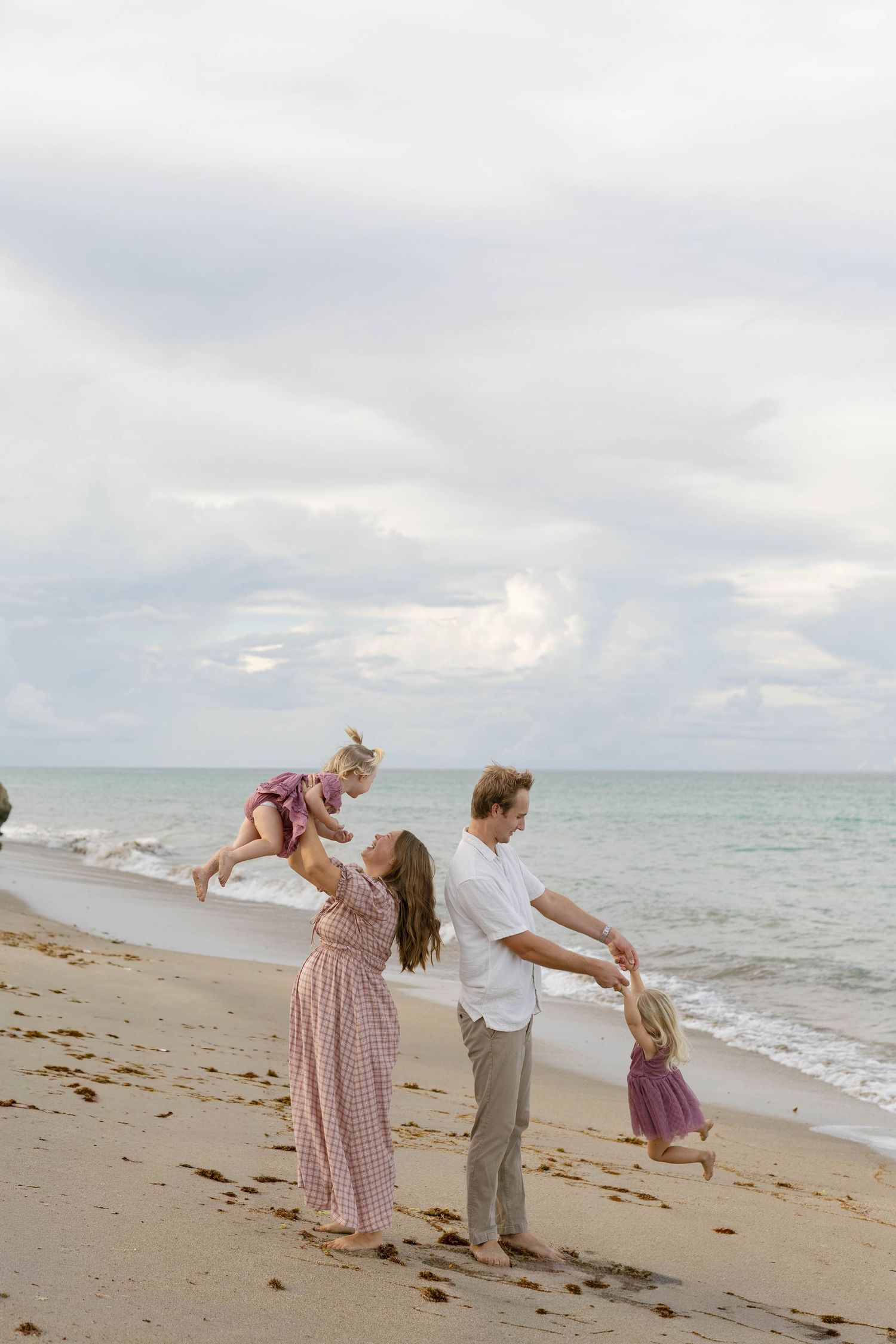 Stuart FL family photographer capturing timeless family photos at House of Refuge. Holiday mini sessions in Stuart, Florida.