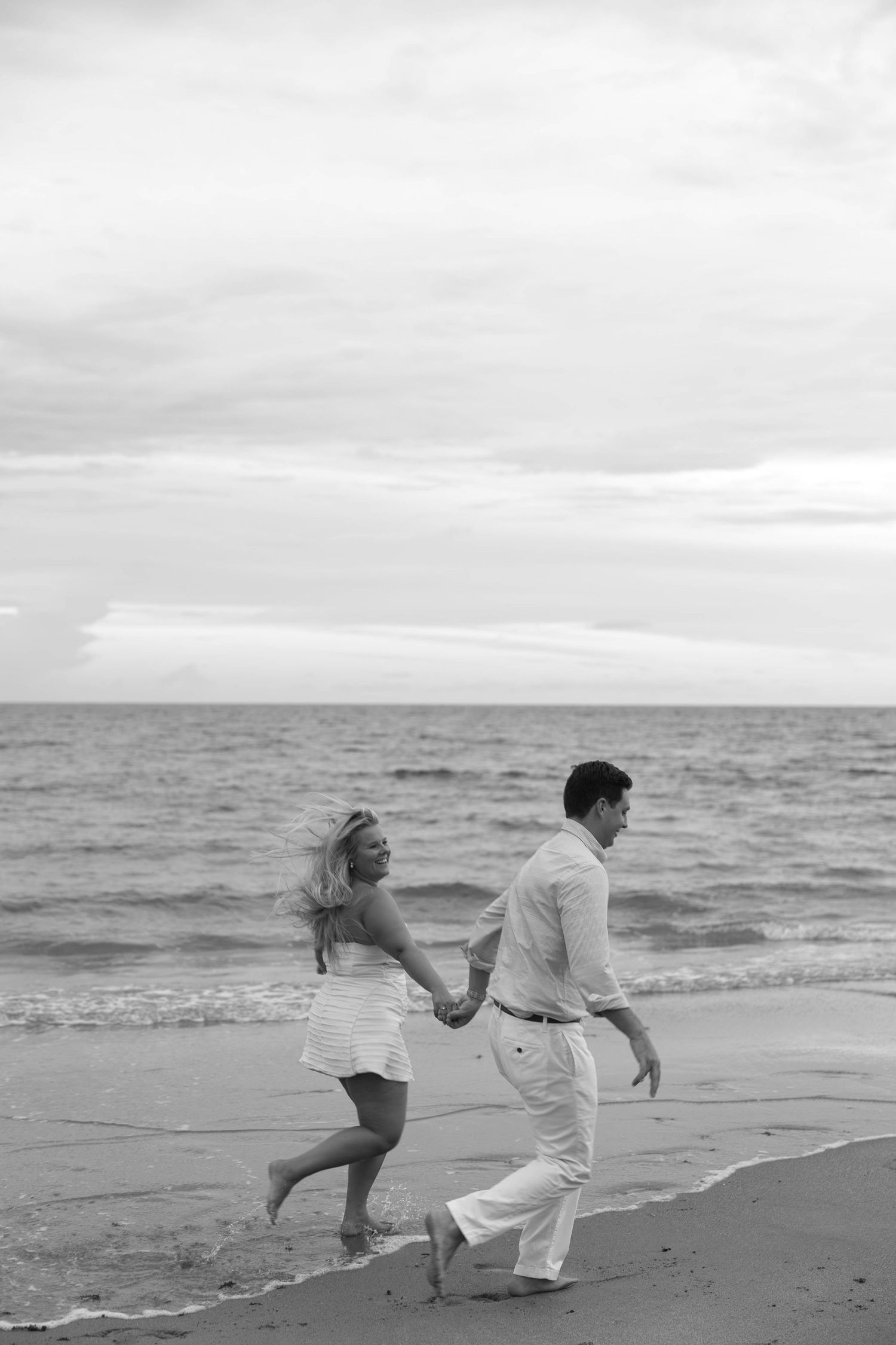 Romantic oceanfront engagement photos of Elliot and Annabel on Palm Beach Island, captured by Daniella Dyan Photography.