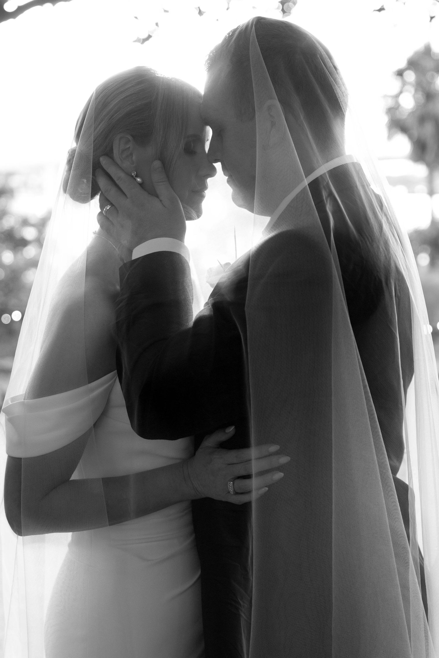 Coastal South Florida wedding portraits at the Jupiter Lighthouse featuring romantic, timeless wedding photography.