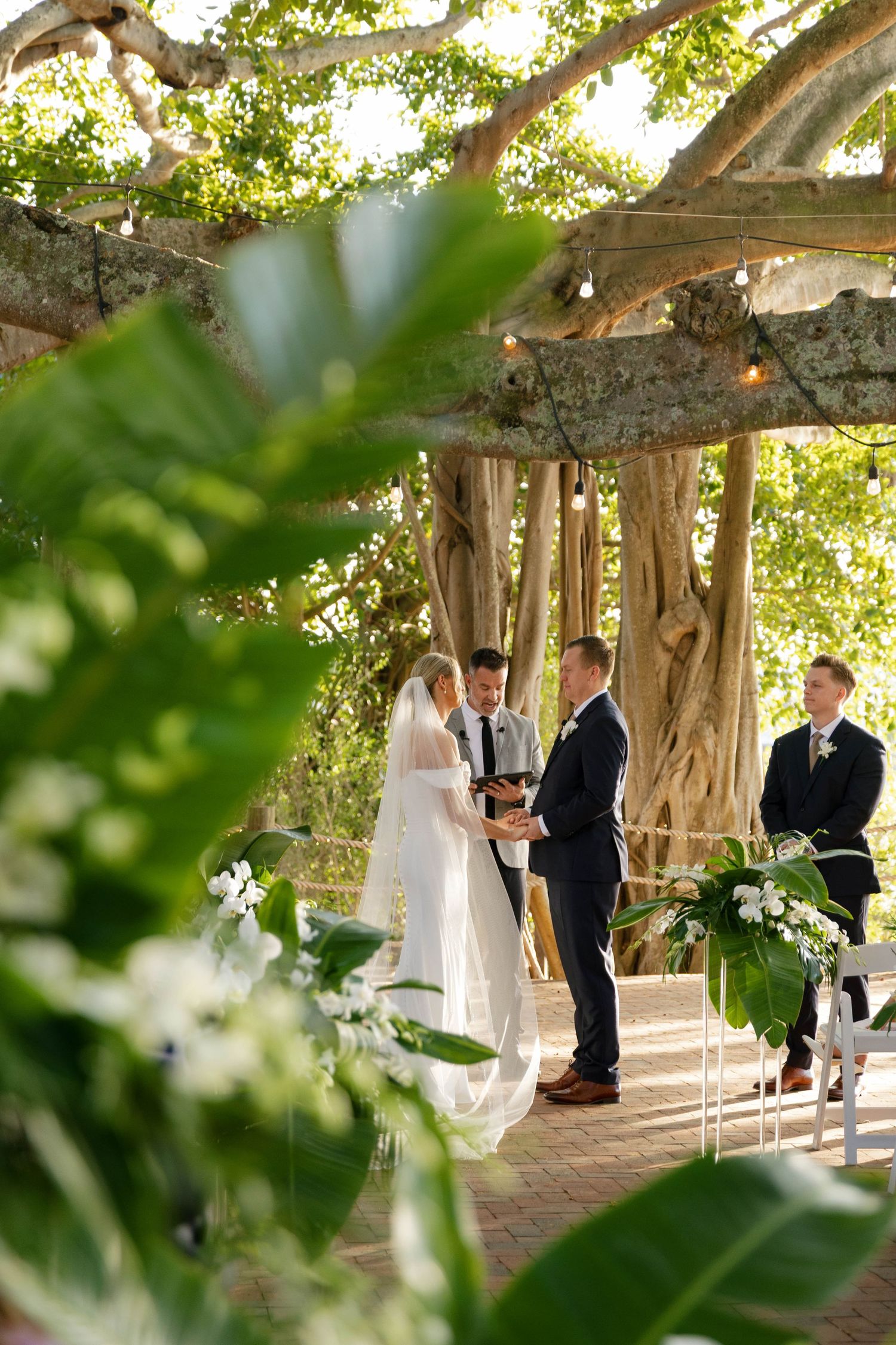 Editorial wedding portraits of a newlywed couple at the iconic Jupiter Inlet Lighthouse in beautiful Jupiter, Florida.