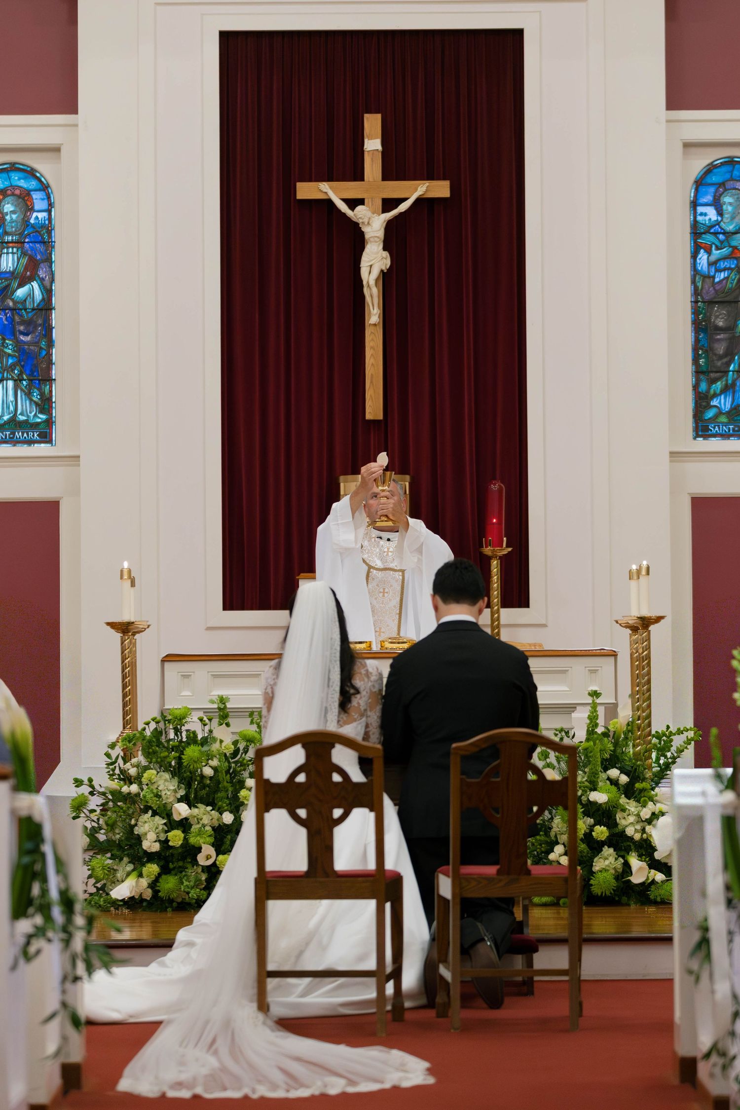 Catholic wedding ceremony at St. Patrick Catholic Church in Mystic, Connecticut, photographed by Daniella Dyan Photography, a New England Ca