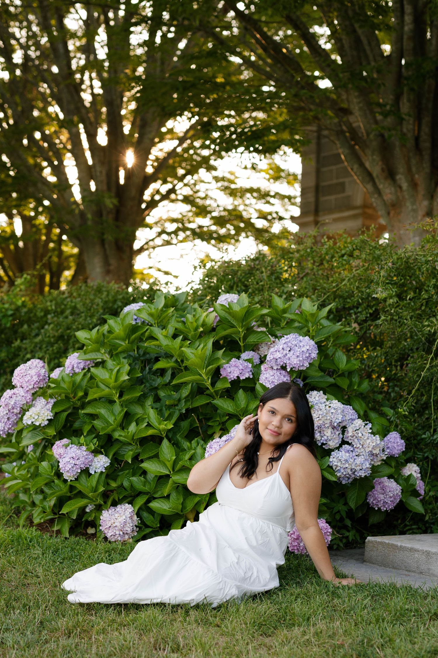 Senior portrait featuring architecture and stone details at Harkness Memorial State Park in Connecticut
