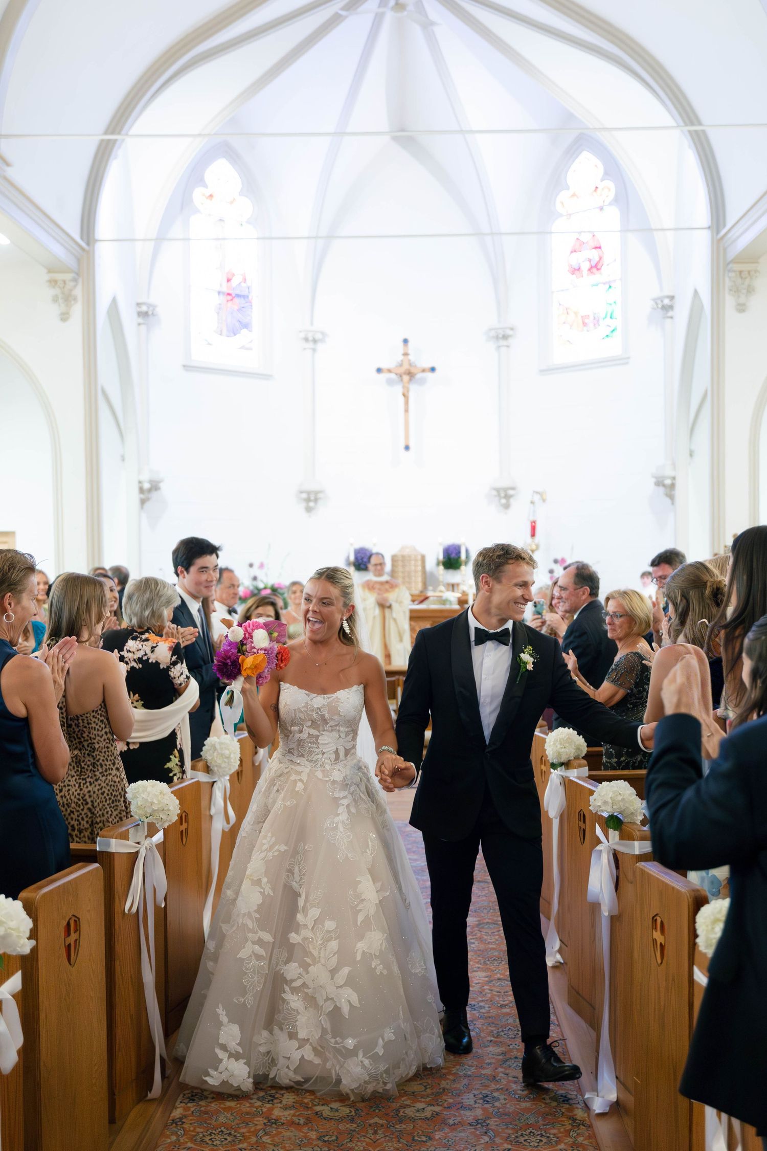 Catholic wedding ceremony in Connecticut, captured by Daniella Dyan Photography, a New England wedding photographer specializing in Catholic