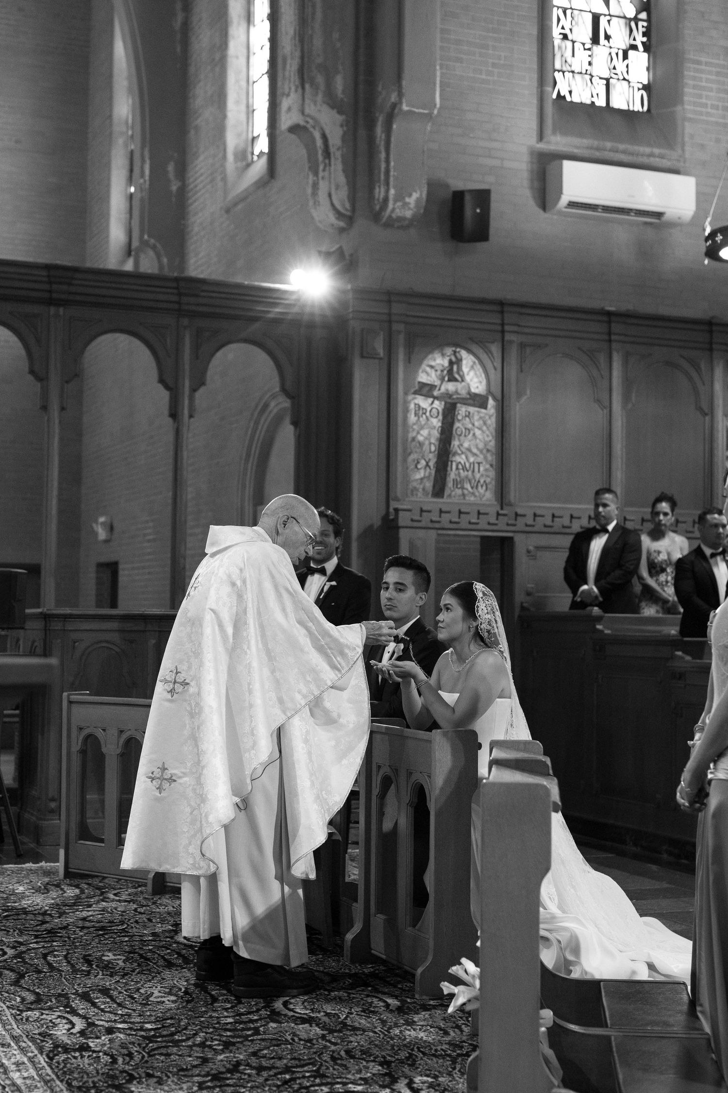 Catholic wedding ceremony in Connecticut, captured by Daniella Dyan Photography, a New England wedding photographer specializing in Catholic