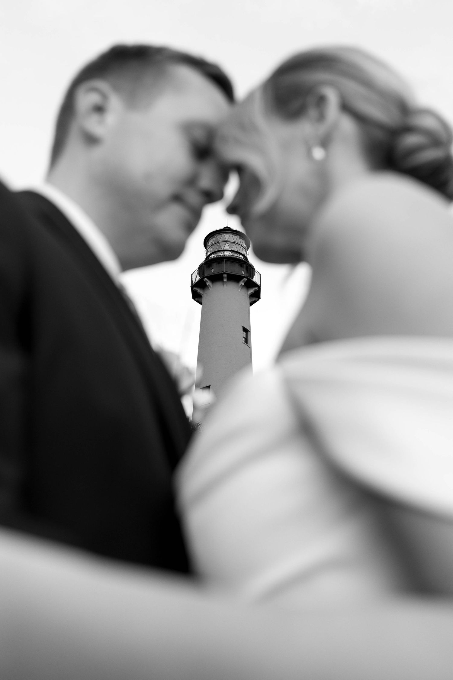 Coastal South Florida wedding portraits at the Jupiter Lighthouse featuring romantic, timeless wedding photography.