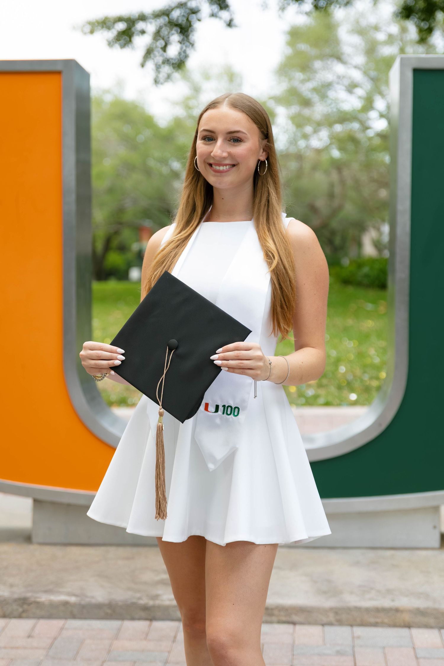 University of Miami graduation photographer offering timeless, true-to-color UMiami senior and grad photos in Coral Gables and Miami, FL.
