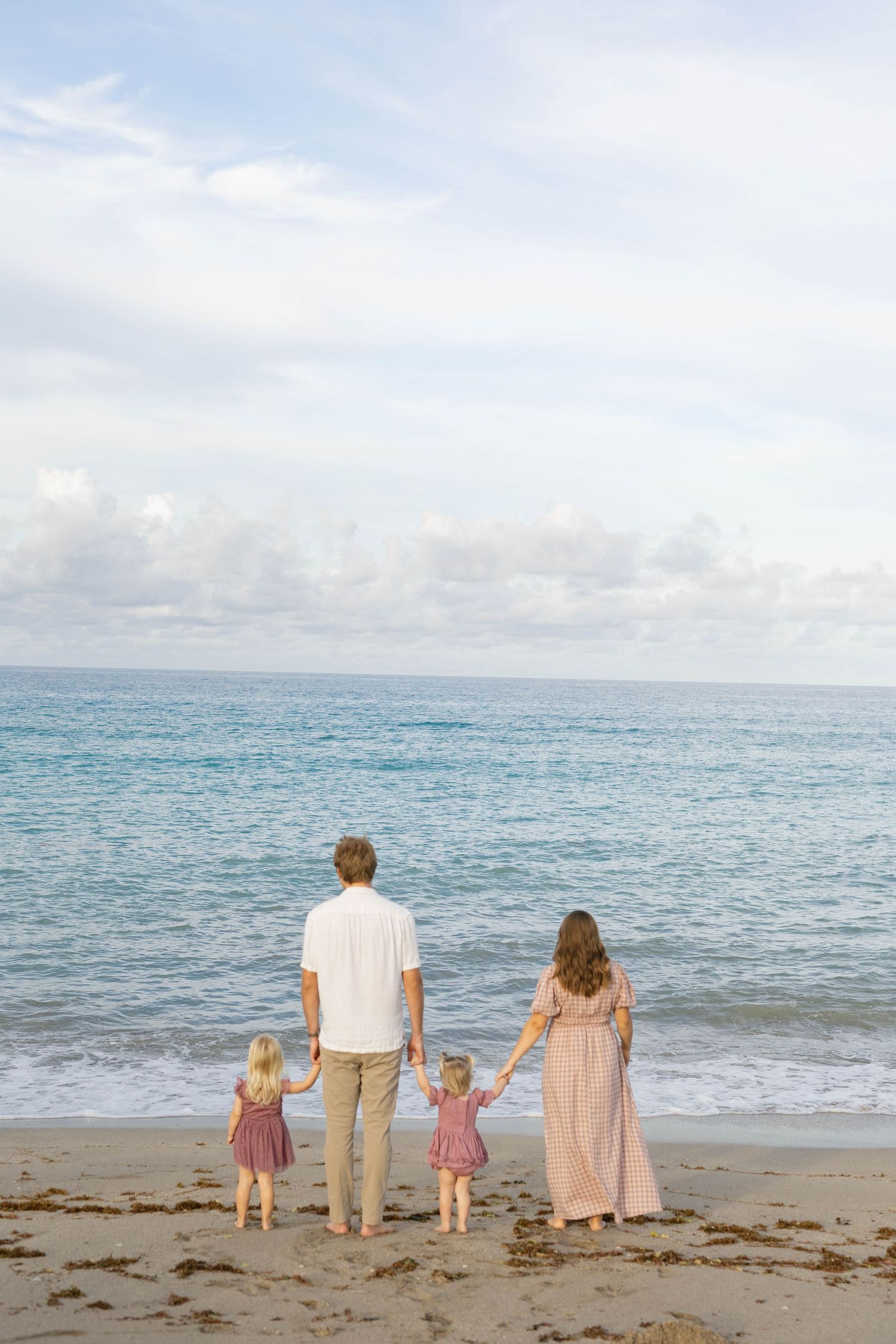 Stuart FL family photographer capturing timeless family photos at House of Refuge. Holiday mini sessions in Stuart, Florida.