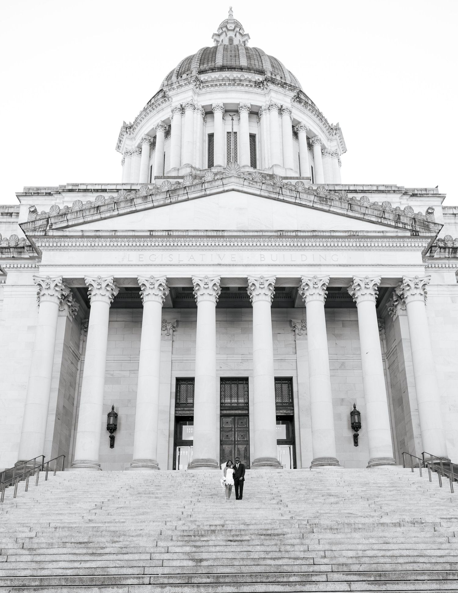 Bride and groom photographed outside the Washington State Capitol in Olympia