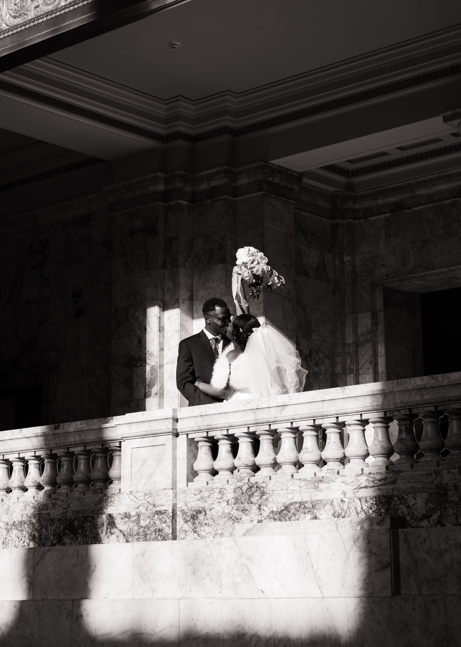 Bride and groom sharing a quiet moment inside the Washington State Capitol in Olympia
