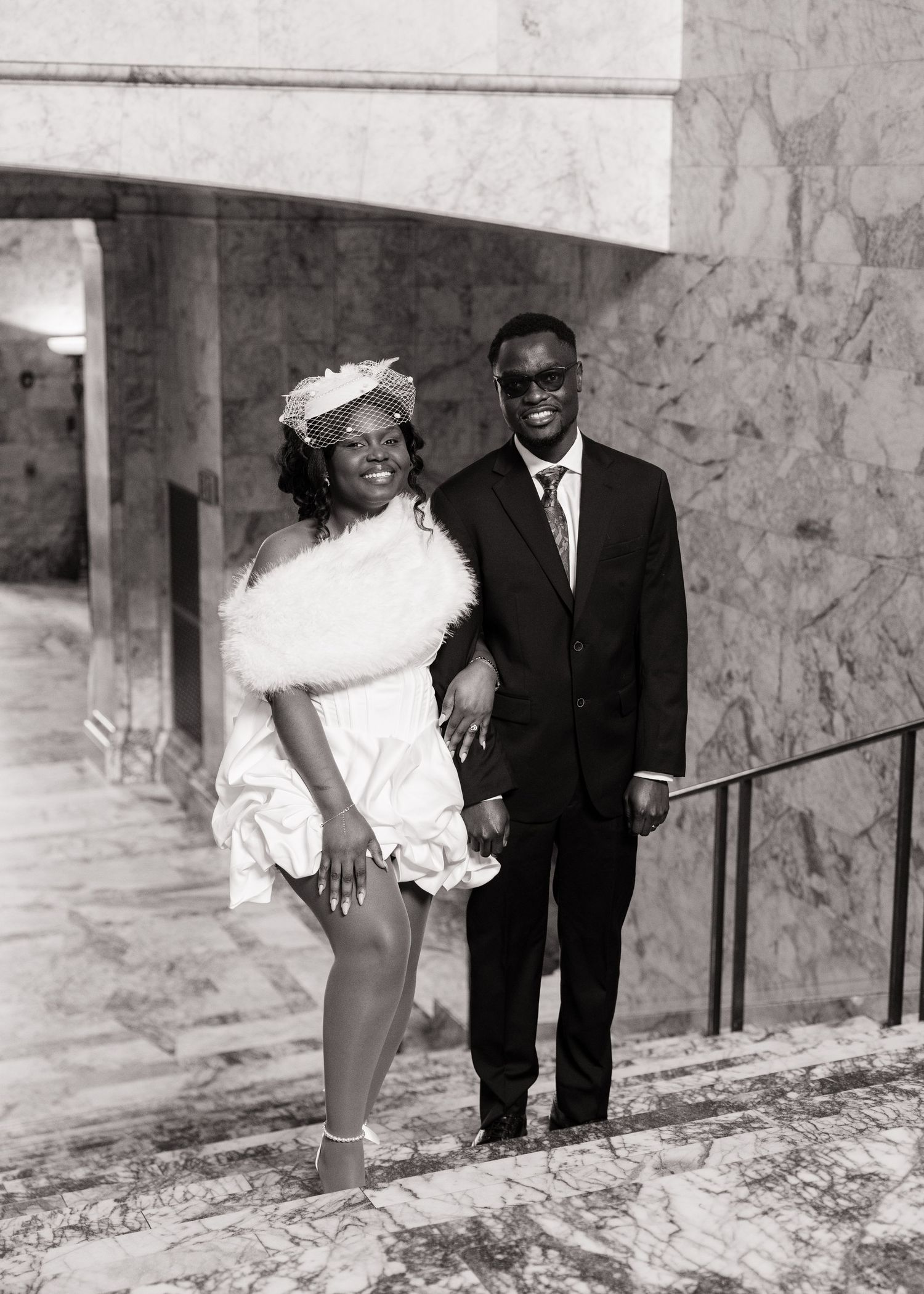 Candid black and white wedding portrait of newlyweds inside the Washington State Capitol