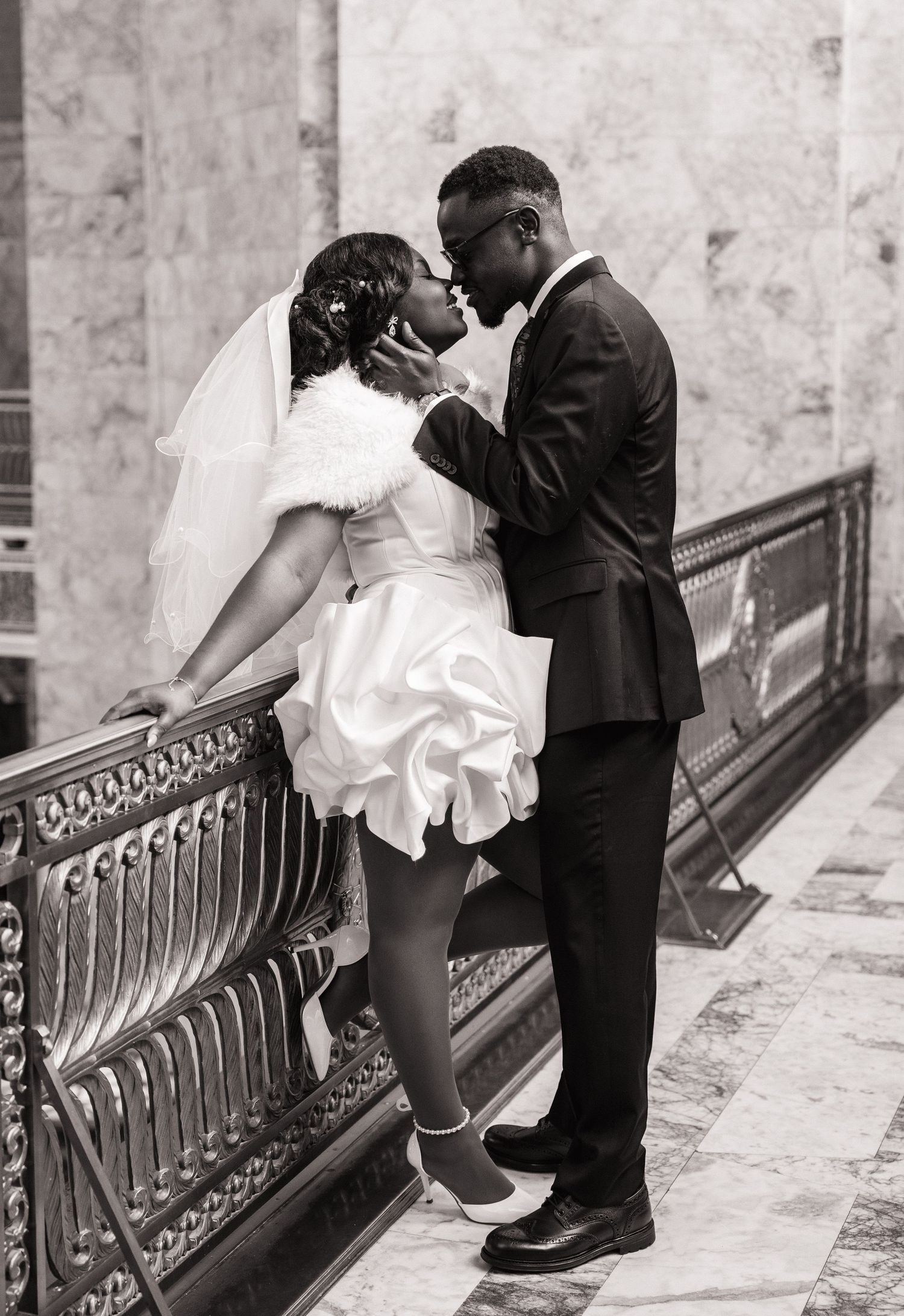 Bride and groom sharing an intimate moment inside the Washington State Capitol