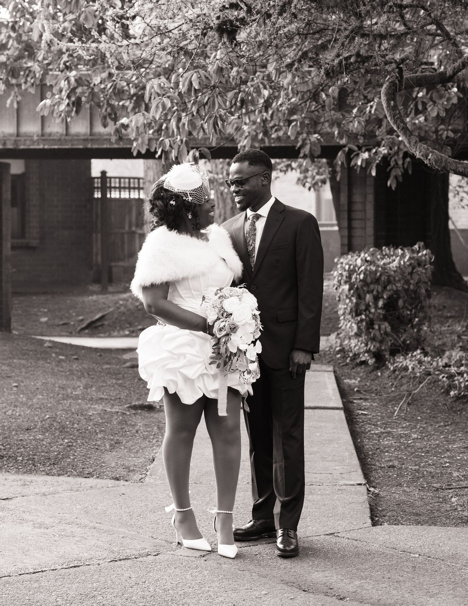 Bride and groom walking together outside the Washington State Capitol in Olympia