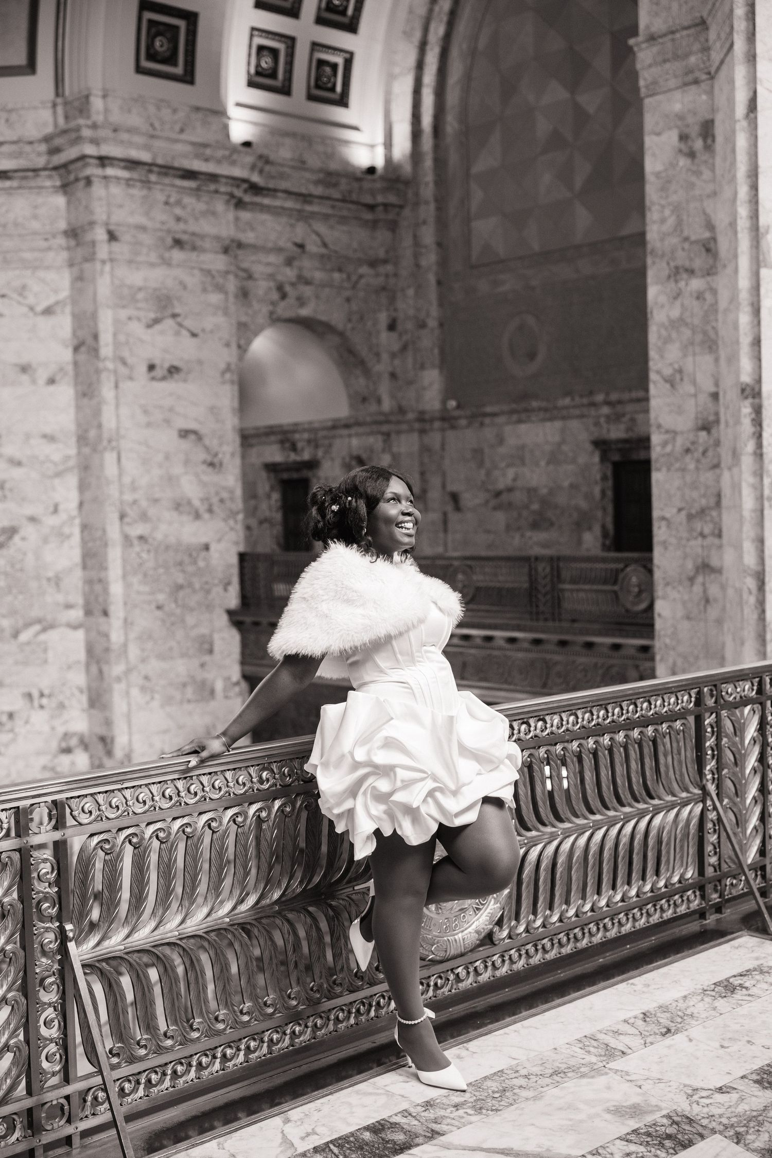 Bride posing inside the Washington State Capitol during her Olympia wedding