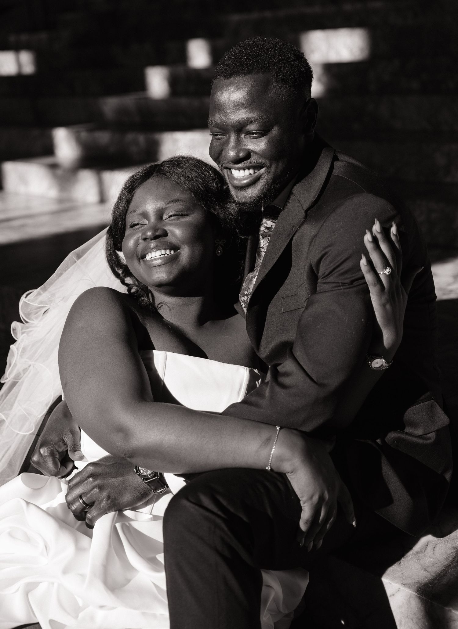 Bride and groom laughing together during their Washington State Capitol wedding in Olympia