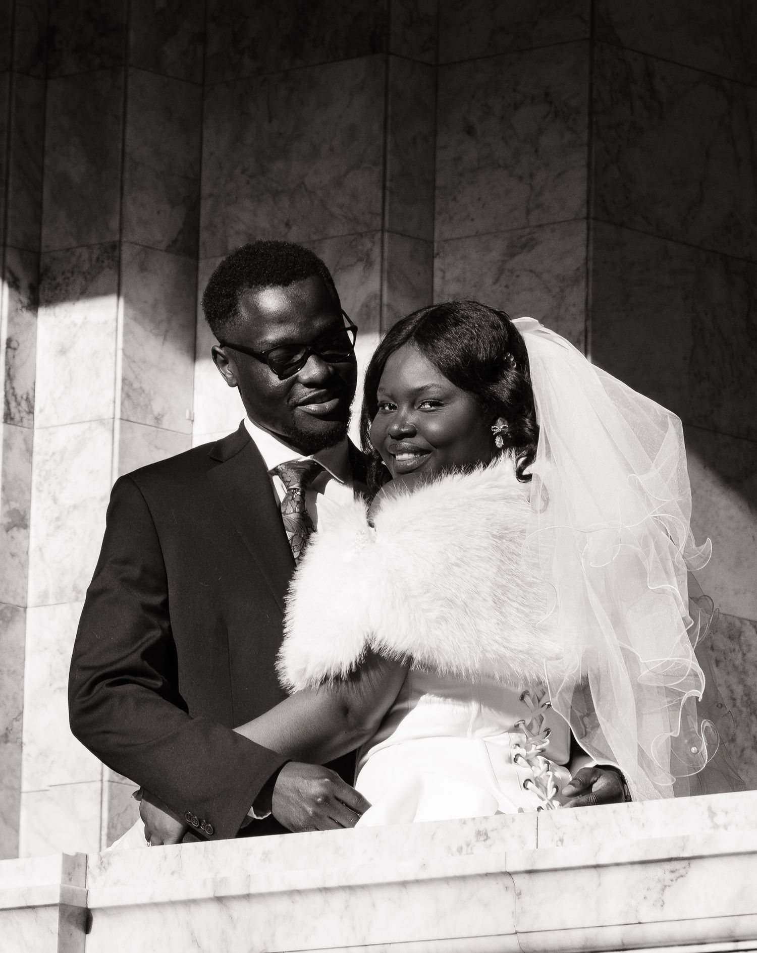 Black and white portrait of newlyweds together inside the Washington State Capitol