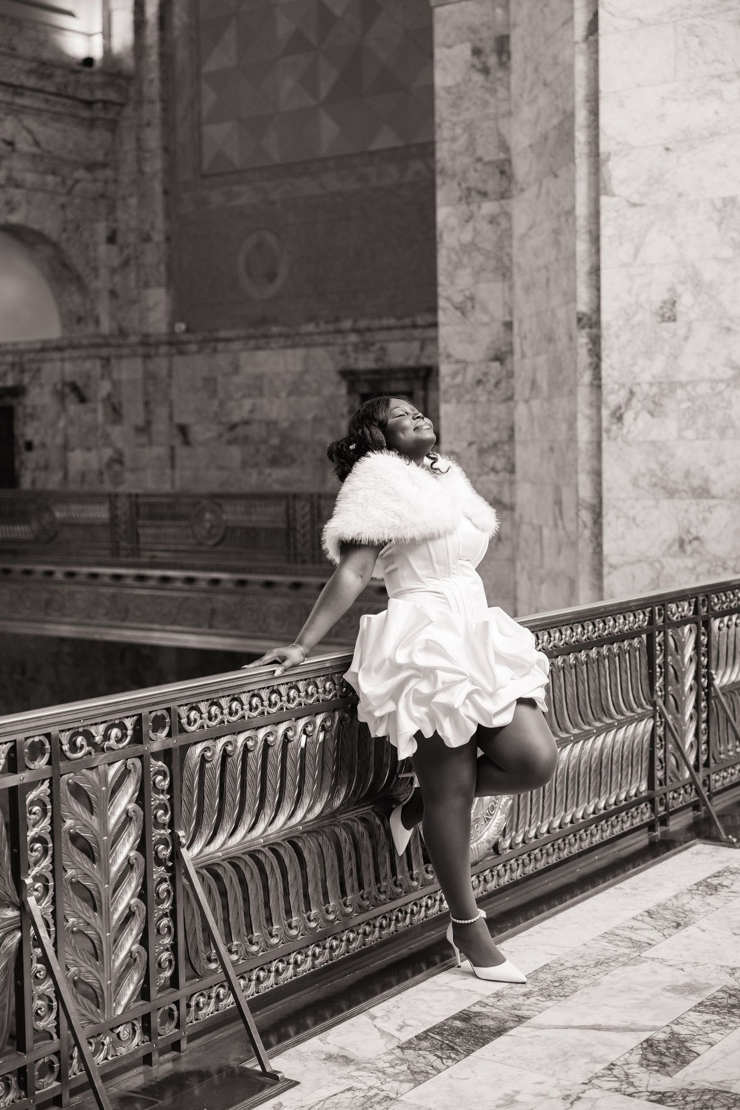 Black and white bridal portrait on a balcony inside the Washington State Capitol