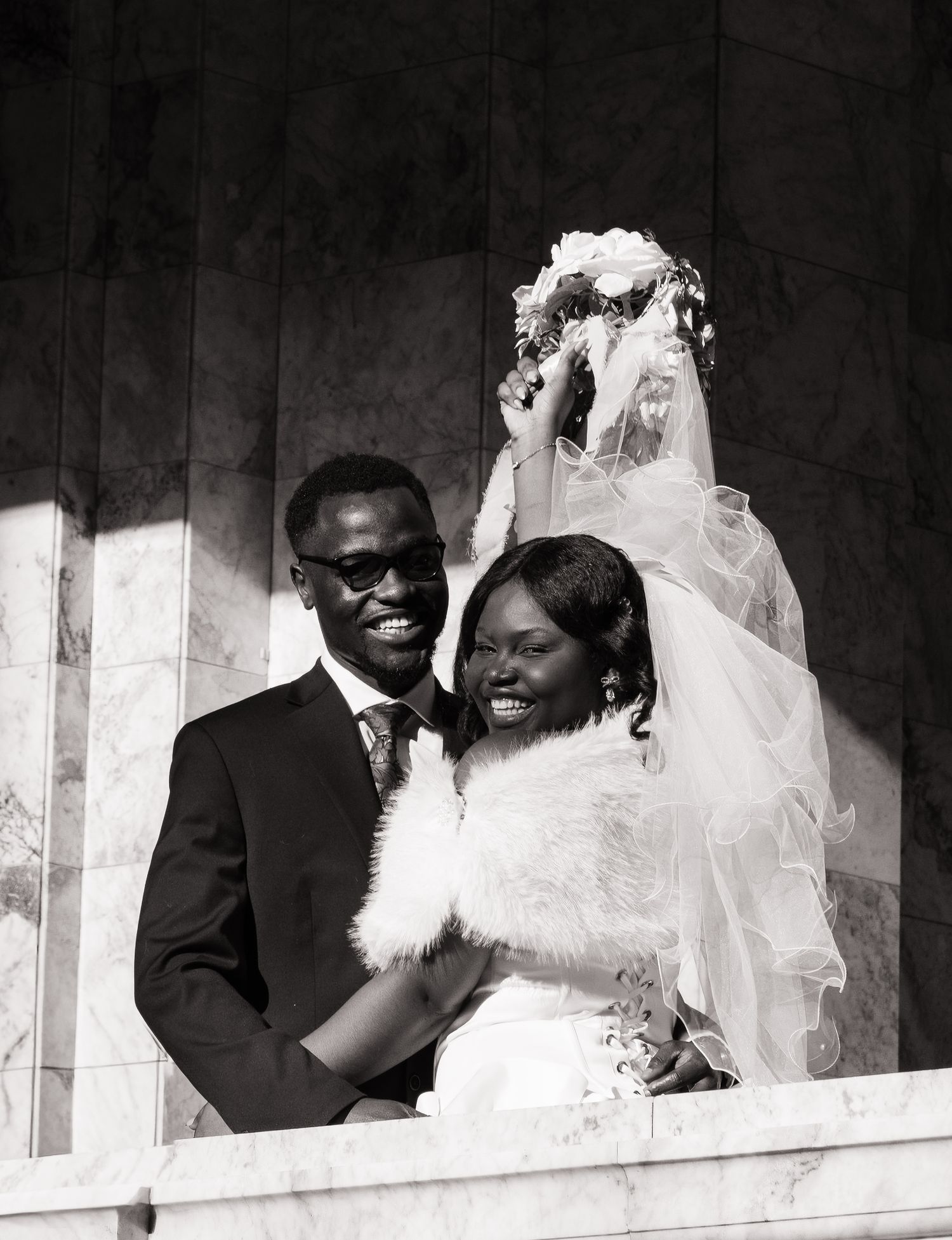 Black and white wedding portrait of newlyweds inside the Washington State Capitol