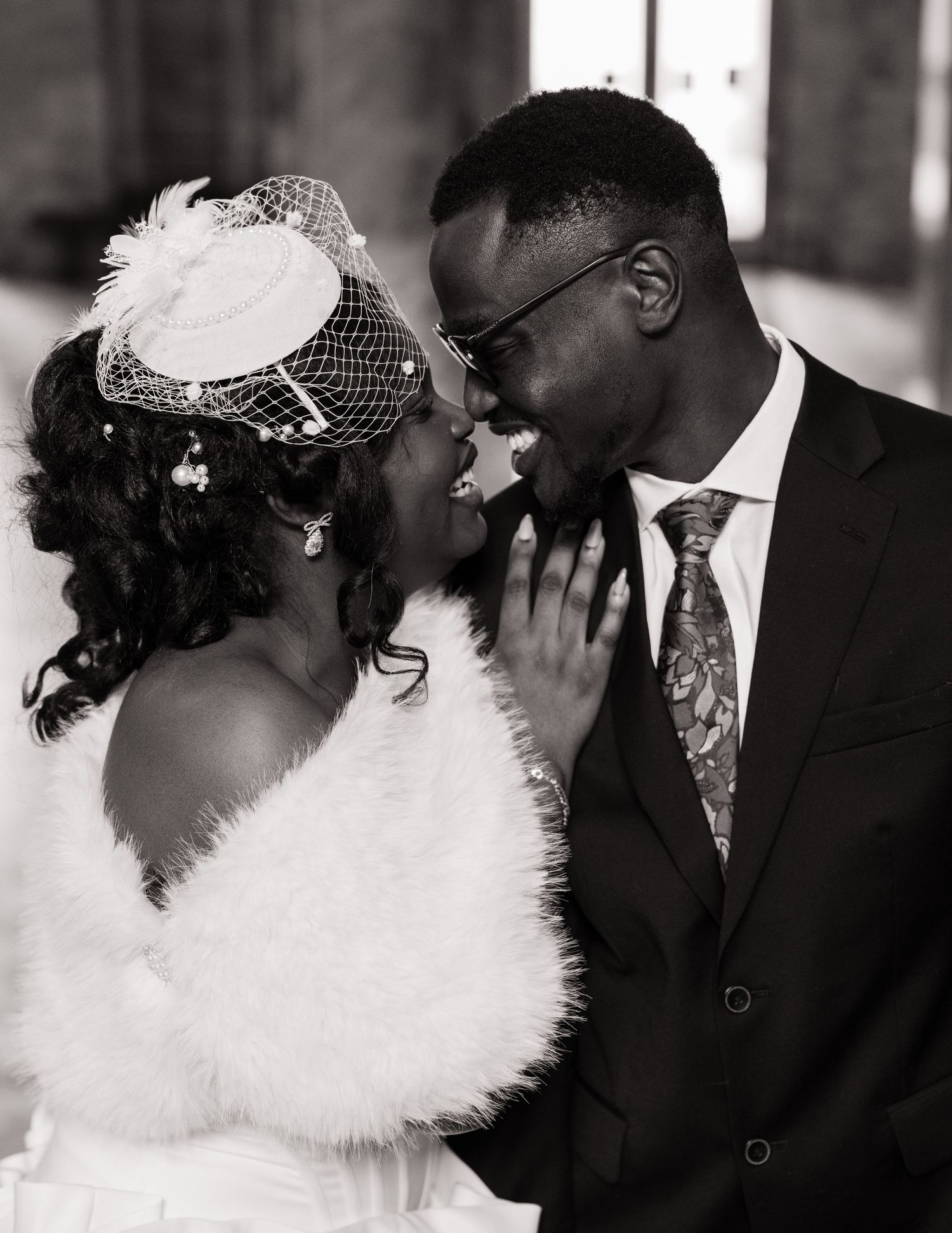 Intimate black and white wedding portrait of a bride and groom inside the Washington State Capitol