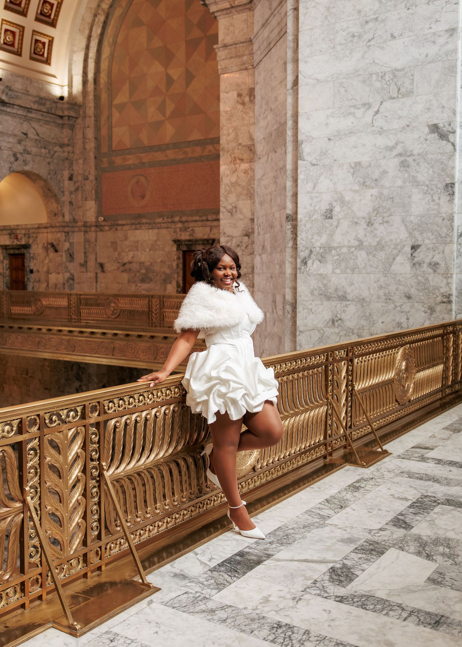 Bridal portrait beside the ornate balcony inside the Washington State Capitol