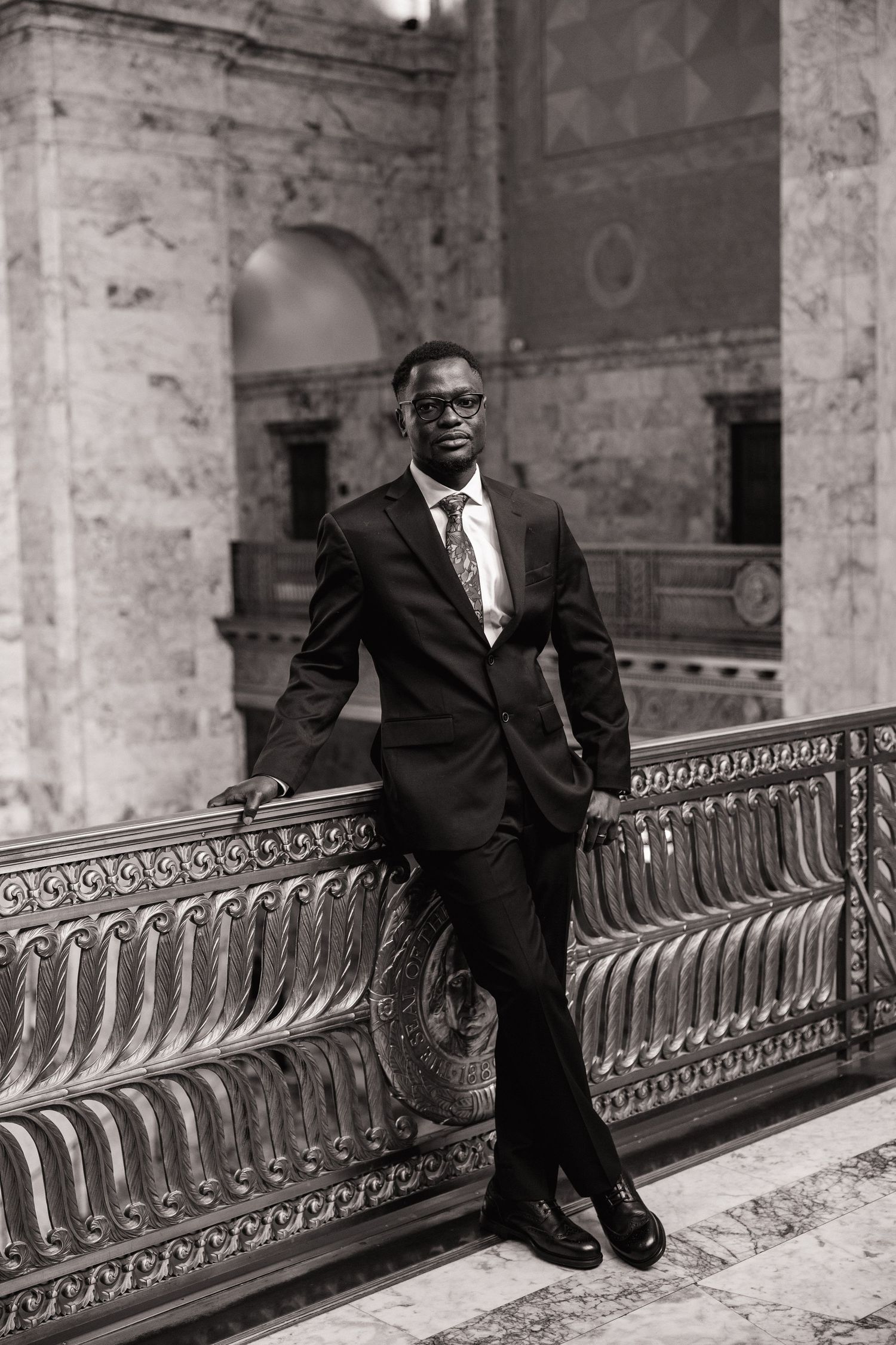 Black and white groom portrait inside the Washington State Capitol in Olympia