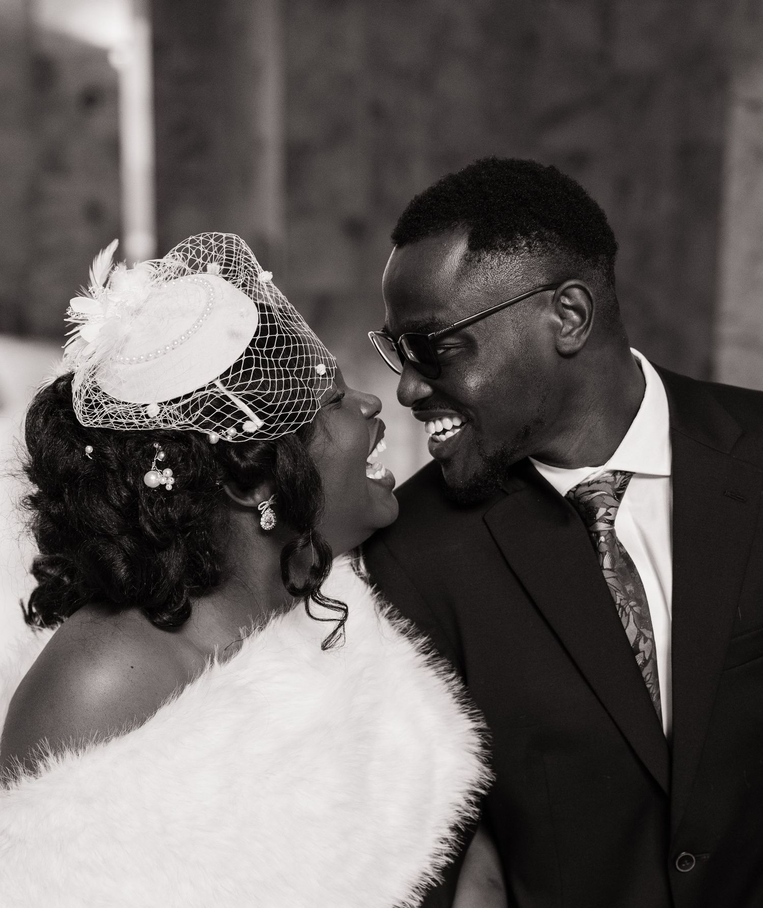 Bride and groom laughing together during their Olympia wedding portraits
